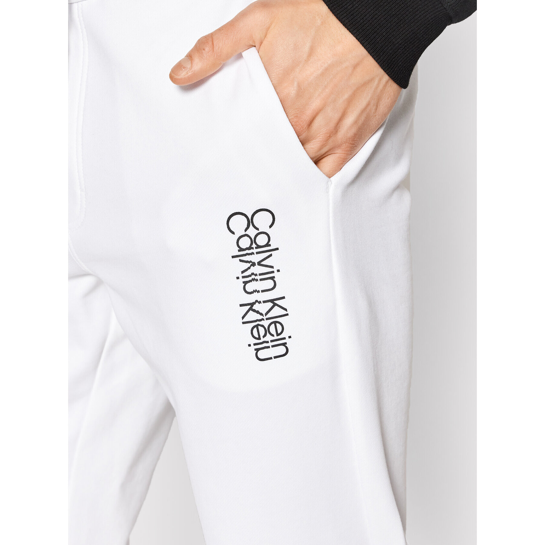 Calvin Klein Pantaloni trening Mirrored Logo K10K108938 Alb Regular Fit - Pled.ro