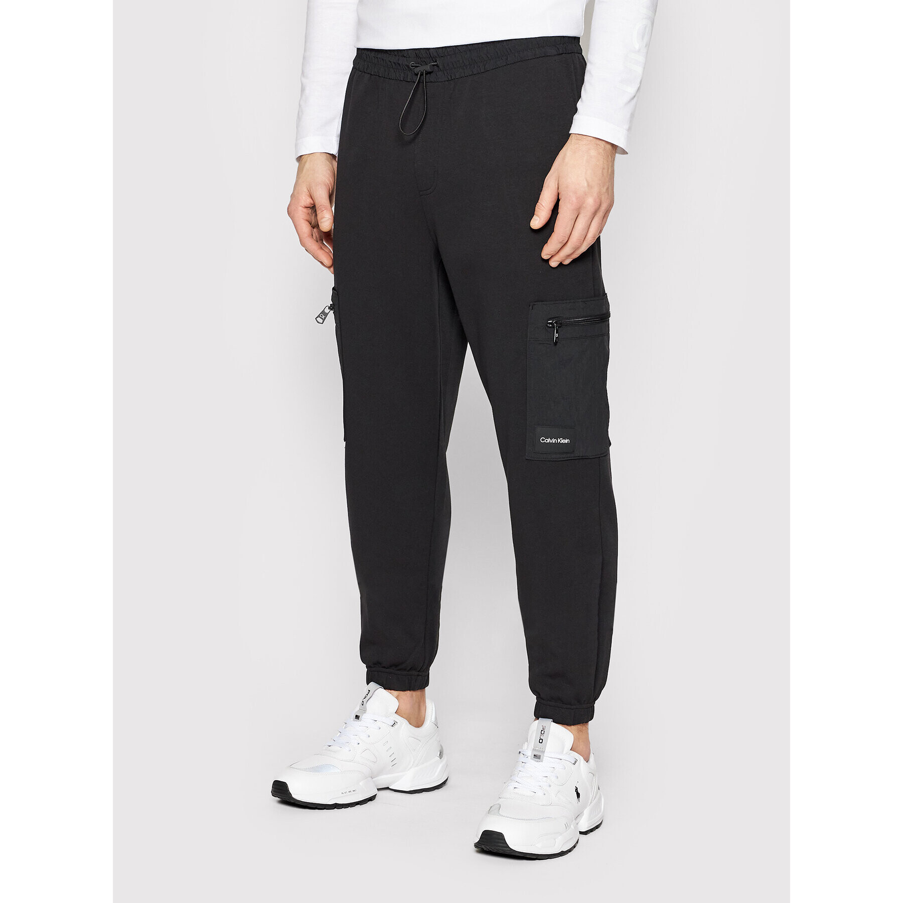 Calvin Klein Pantaloni trening Tech Repreve Comfort K10K108940 Negru Relaxed Fit - Pled.ro