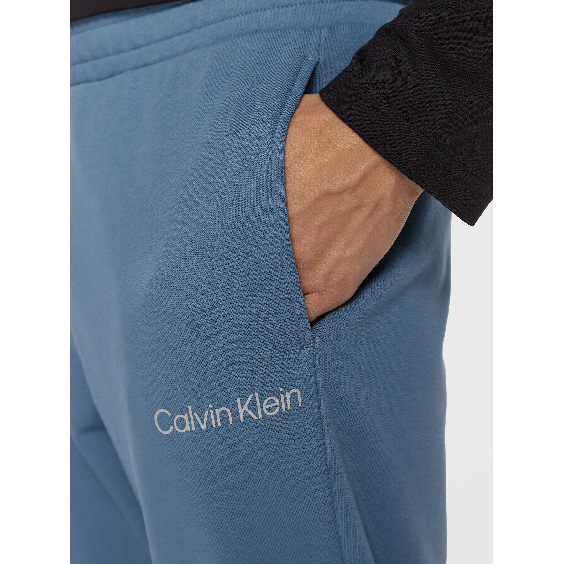 Calvin Klein Performance Pantaloni trening 00GMS2P606 Albastru Regular Fit - Pled.ro