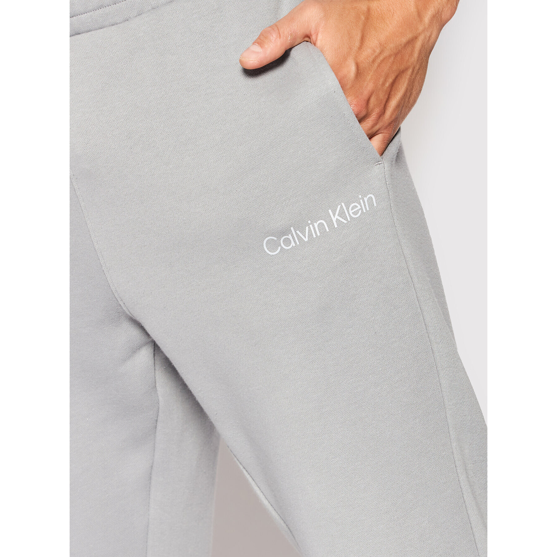 Calvin Klein Performance Pantaloni trening 00GMS2P606 Gri Regular Fit - Pled.ro