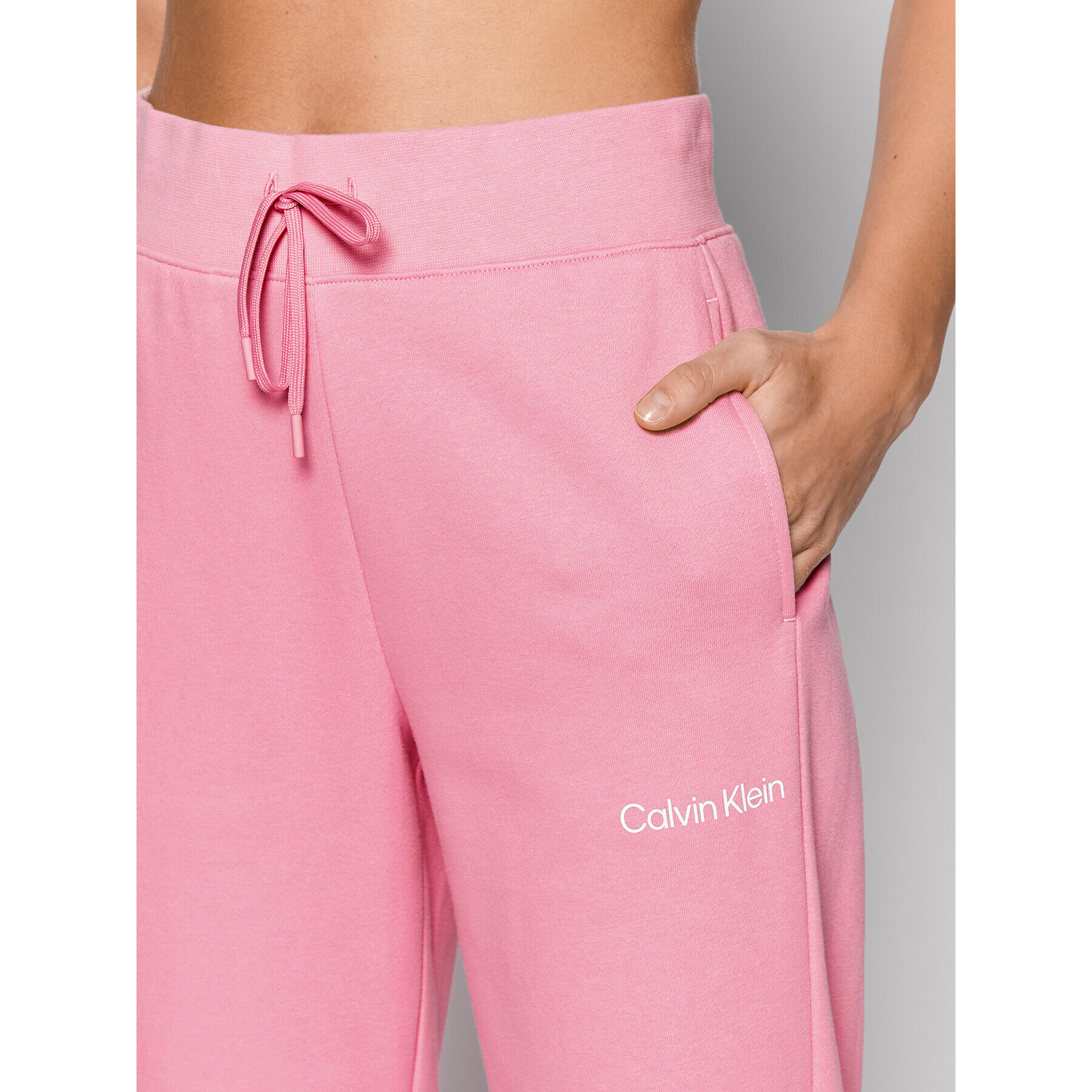 Calvin Klein Performance Pantaloni trening 00GWS2P608 Roz Regular Fit - Pled.ro