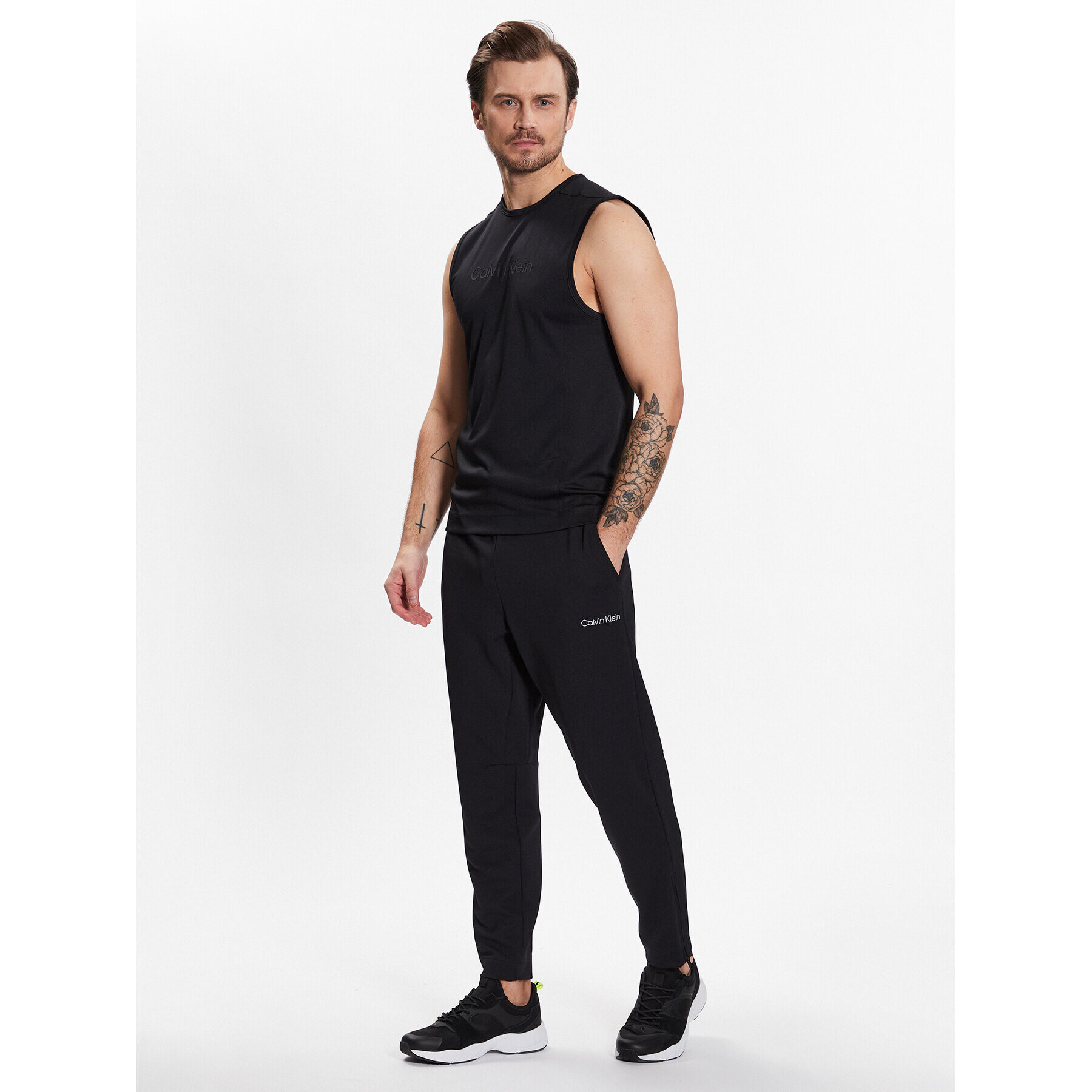 Calvin Klein Performance Pantaloni trening Knit Pant 00GMS3P602 Negru Regular Fit - Pled.ro