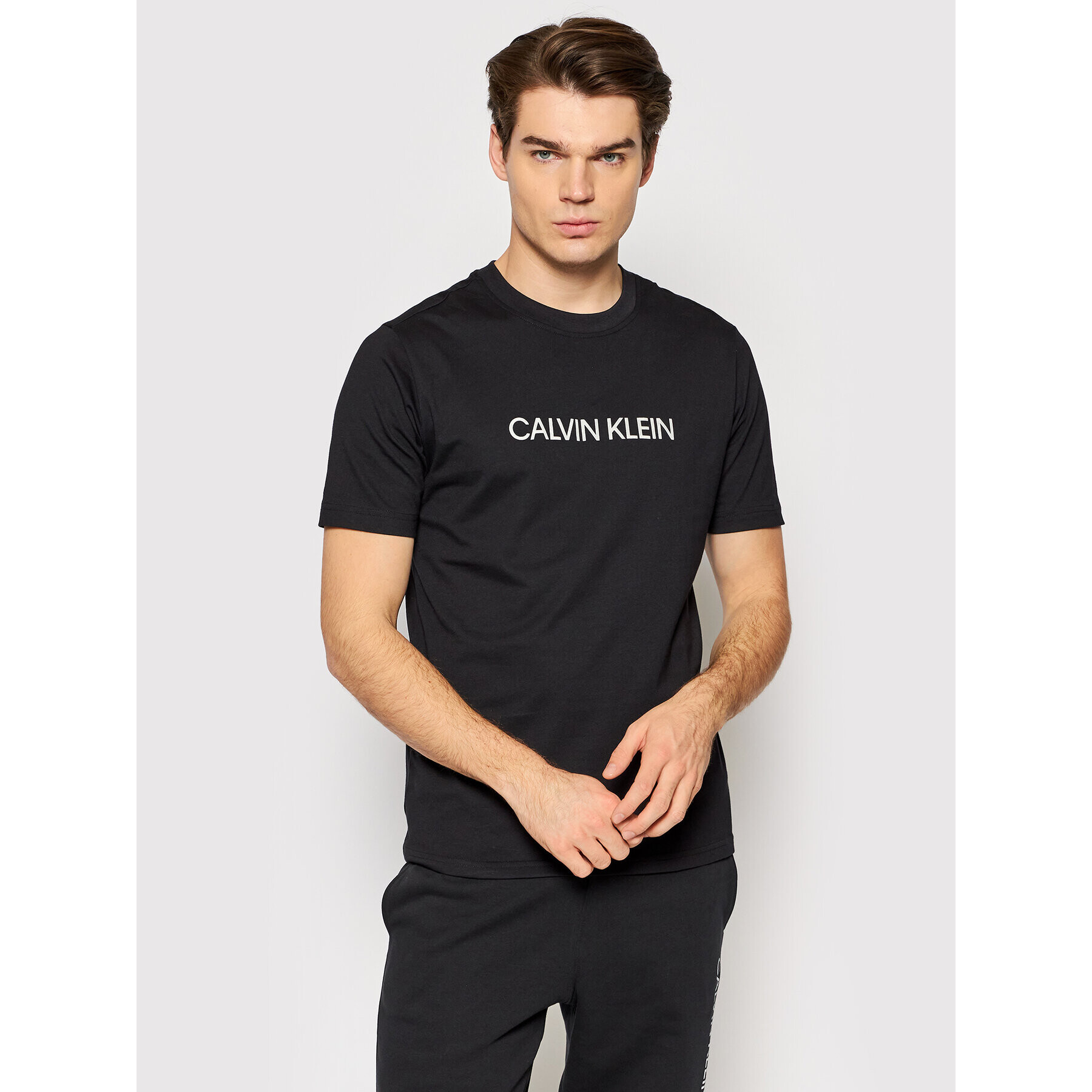 Calvin Klein Performance Tricou 00GMF1K107 Negru Regular Fit - Pled.ro