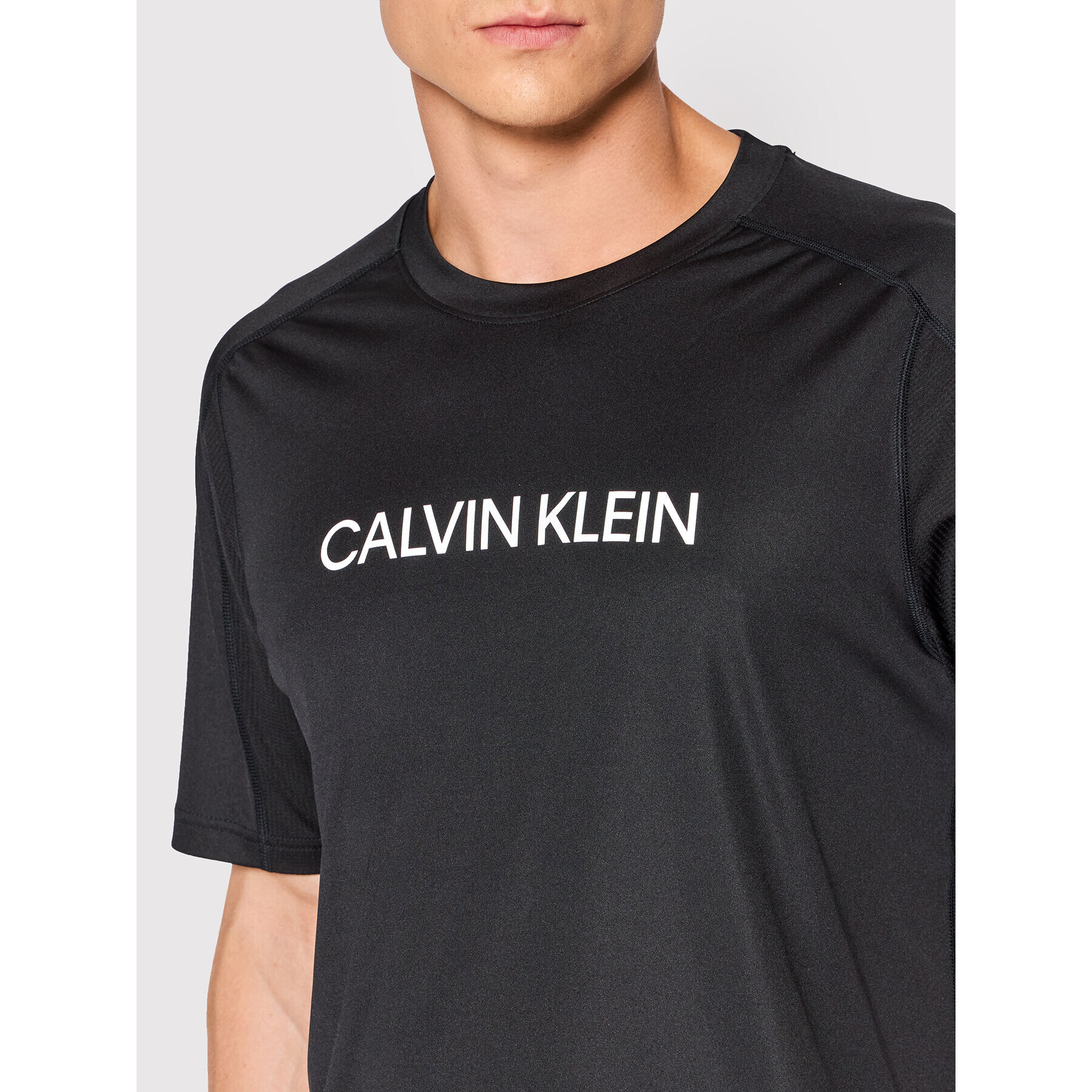 Calvin Klein Performance Tricou tehnic 00GMF1K109 Negru Regular Fit - Pled.ro