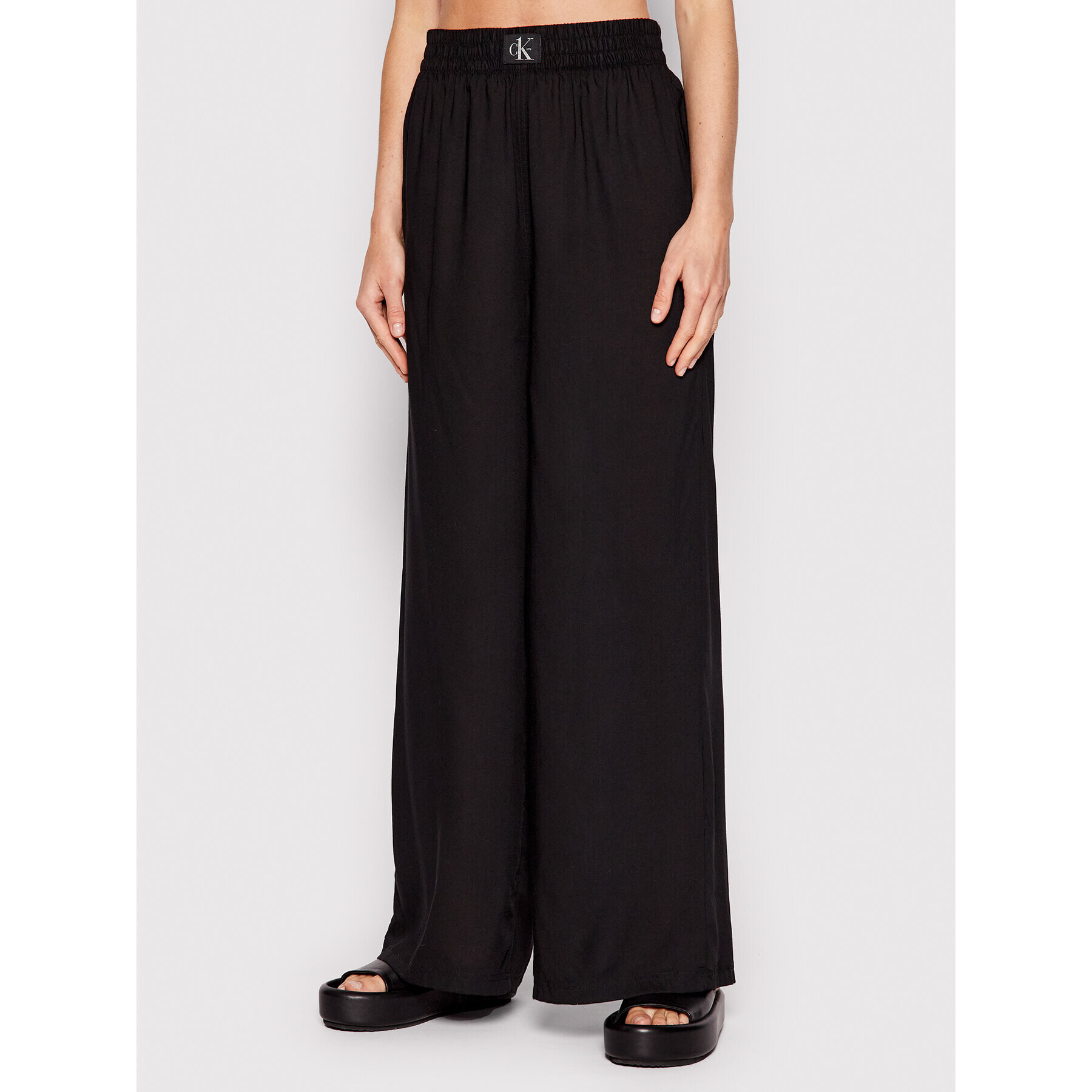 Calvin Klein Swimwear Pantaloni din material KW0KW01784 Negru Relaxed Fit - Pled.ro