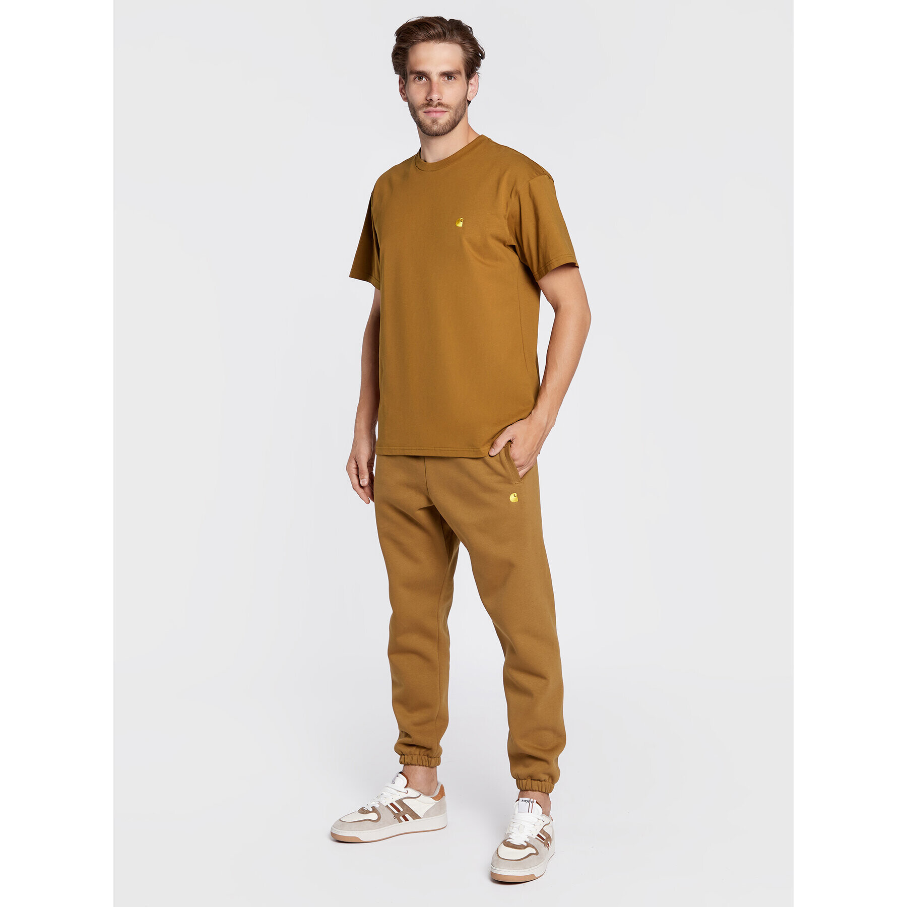 Carhartt WIP Pantaloni trening Chase I028284 Maro Loose Fit - Pled.ro