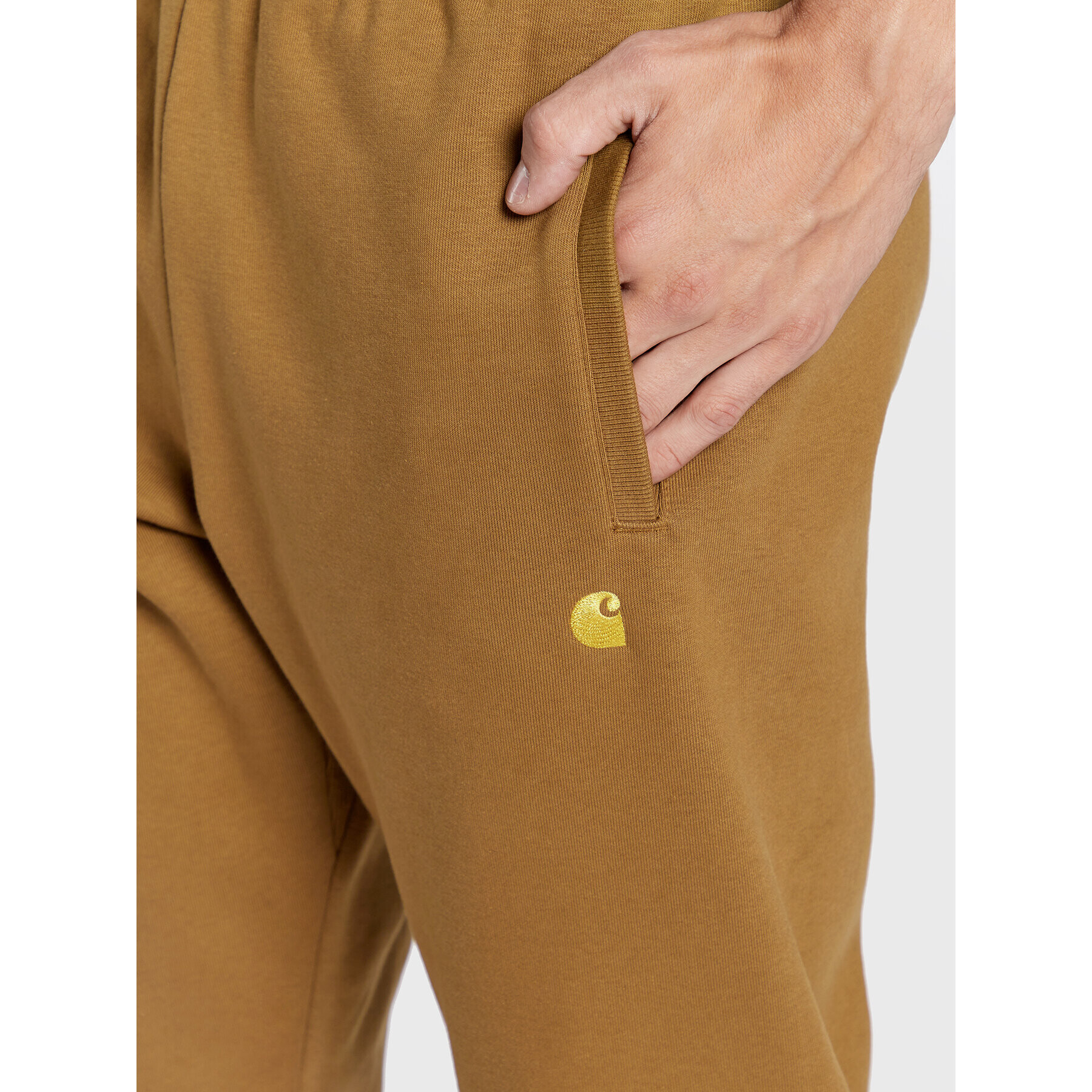 Carhartt WIP Pantaloni trening Chase I028284 Maro Loose Fit - Pled.ro