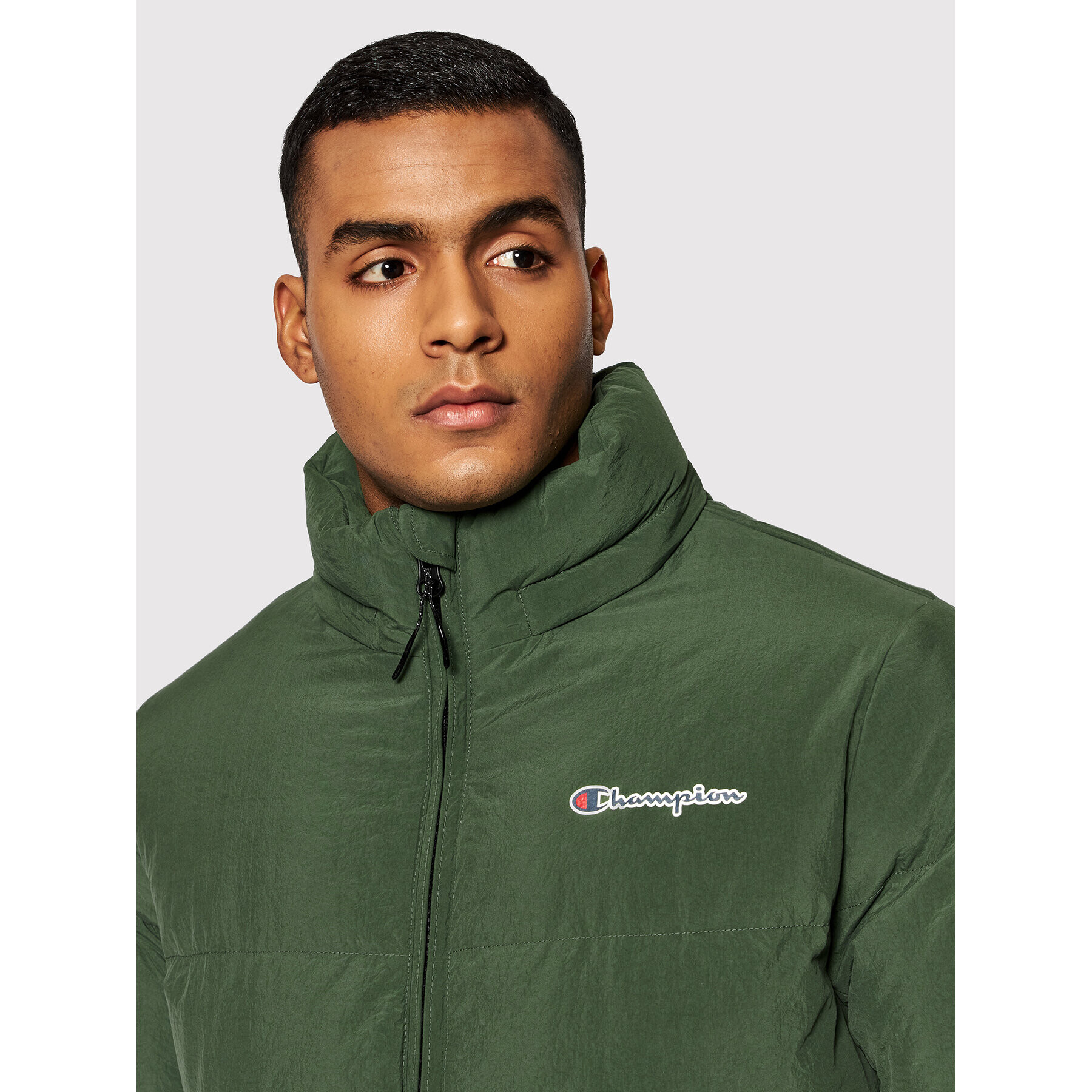 Champion Geacă din puf High Neck Script Logo 216953 Verde Regular Fit - Pled.ro