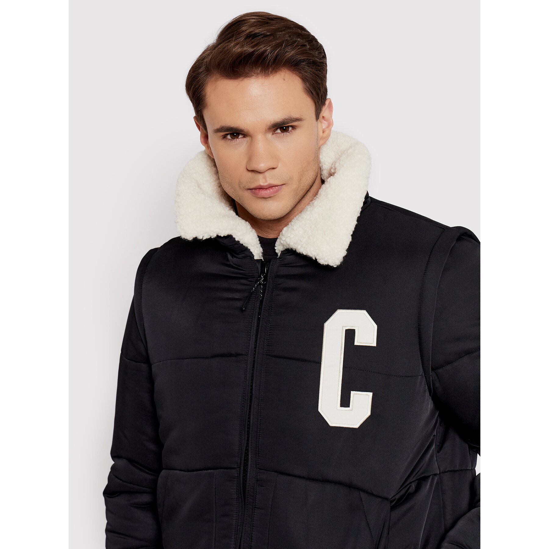 Champion Geacă din puf Teddy 216735 Negru Regular Fit - Pled.ro