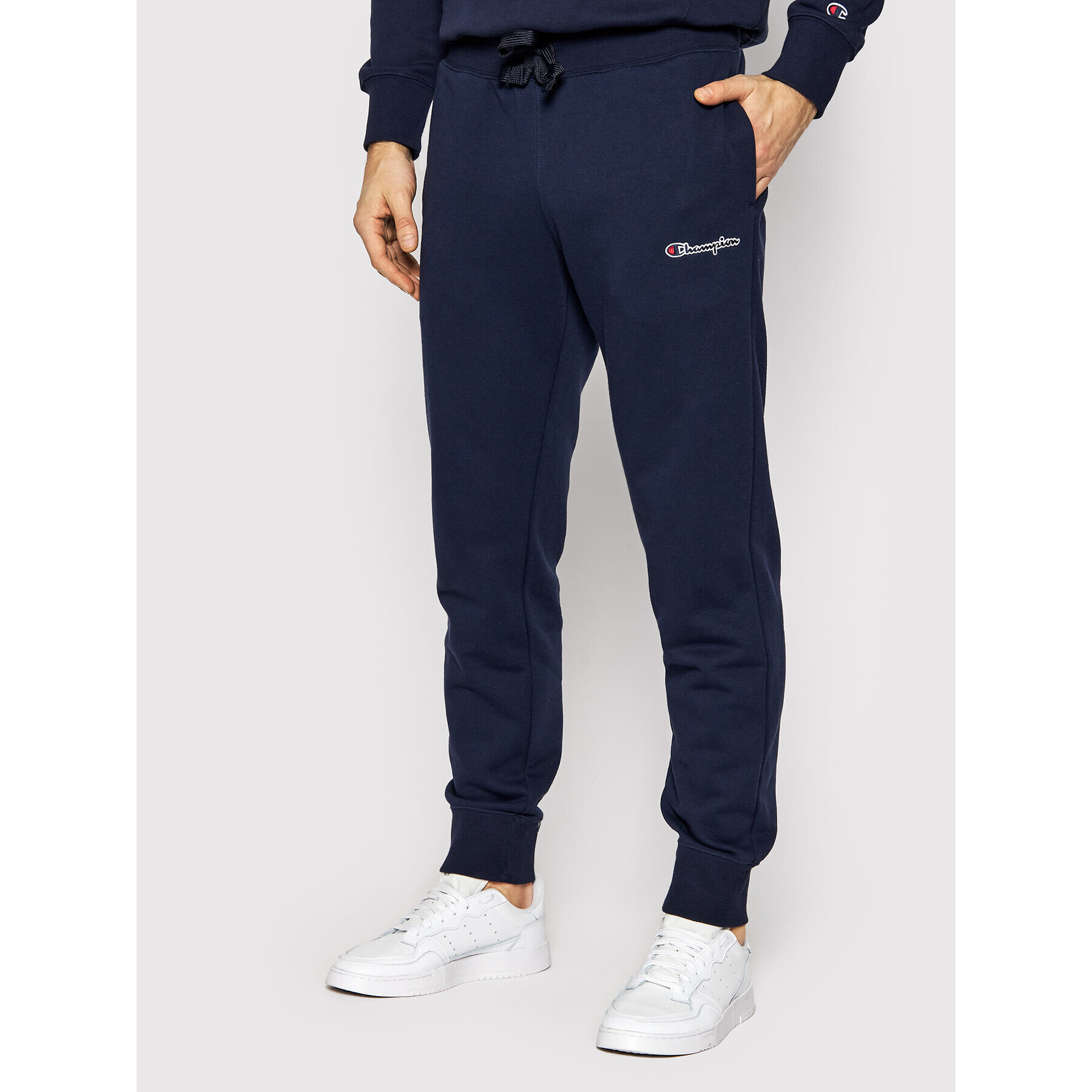 Champion Pantaloni trening 217067 Bleumarin Regular Fit - Pled.ro