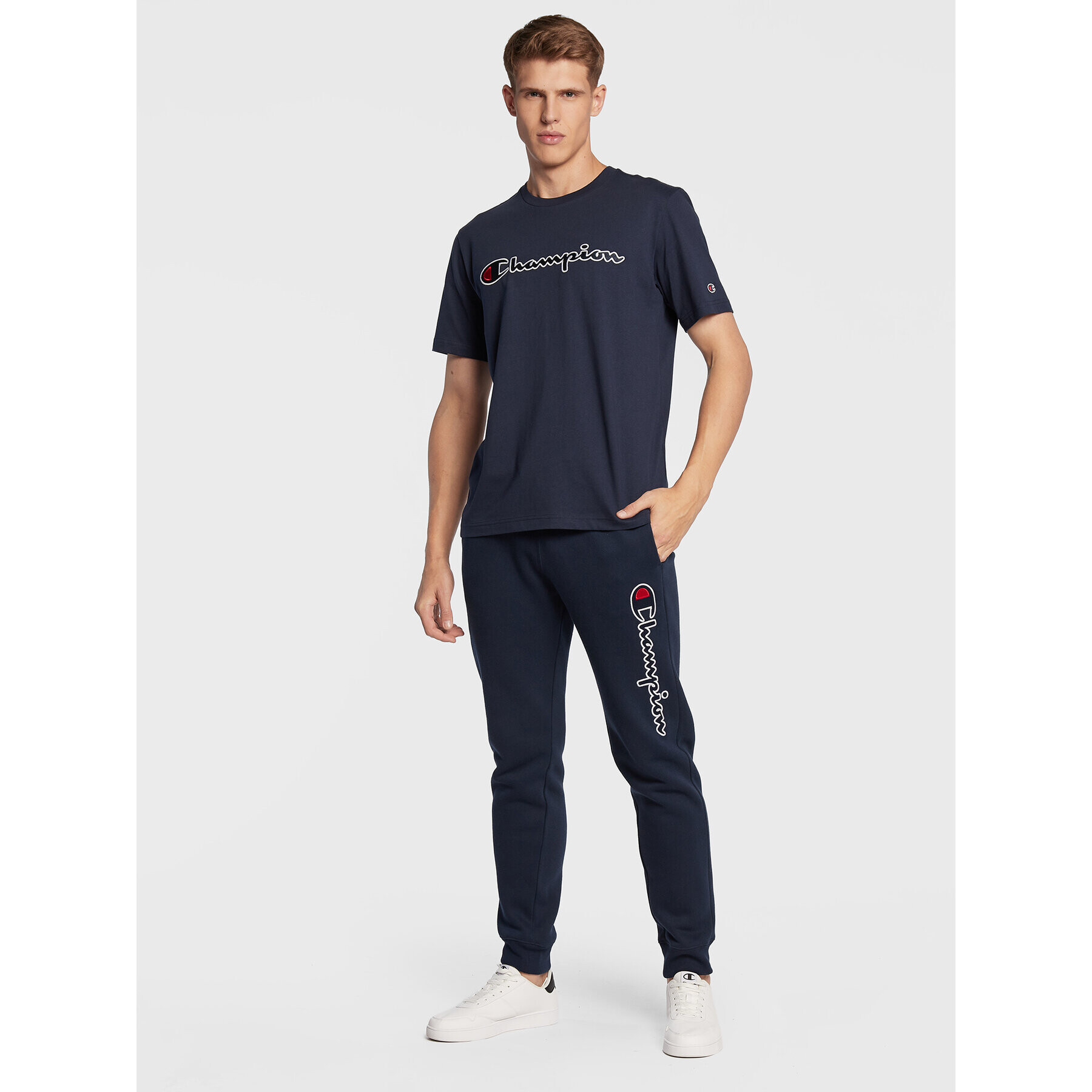 Champion Pantaloni trening 217860 Bleumarin Regular Fit - Pled.ro