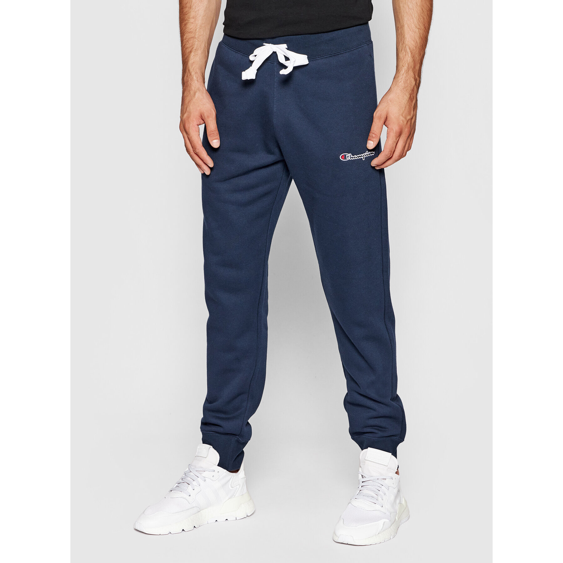 Champion Pantaloni trening Blend Small Script Logo 216479 Bleumarin Regular Fit - Pled.ro