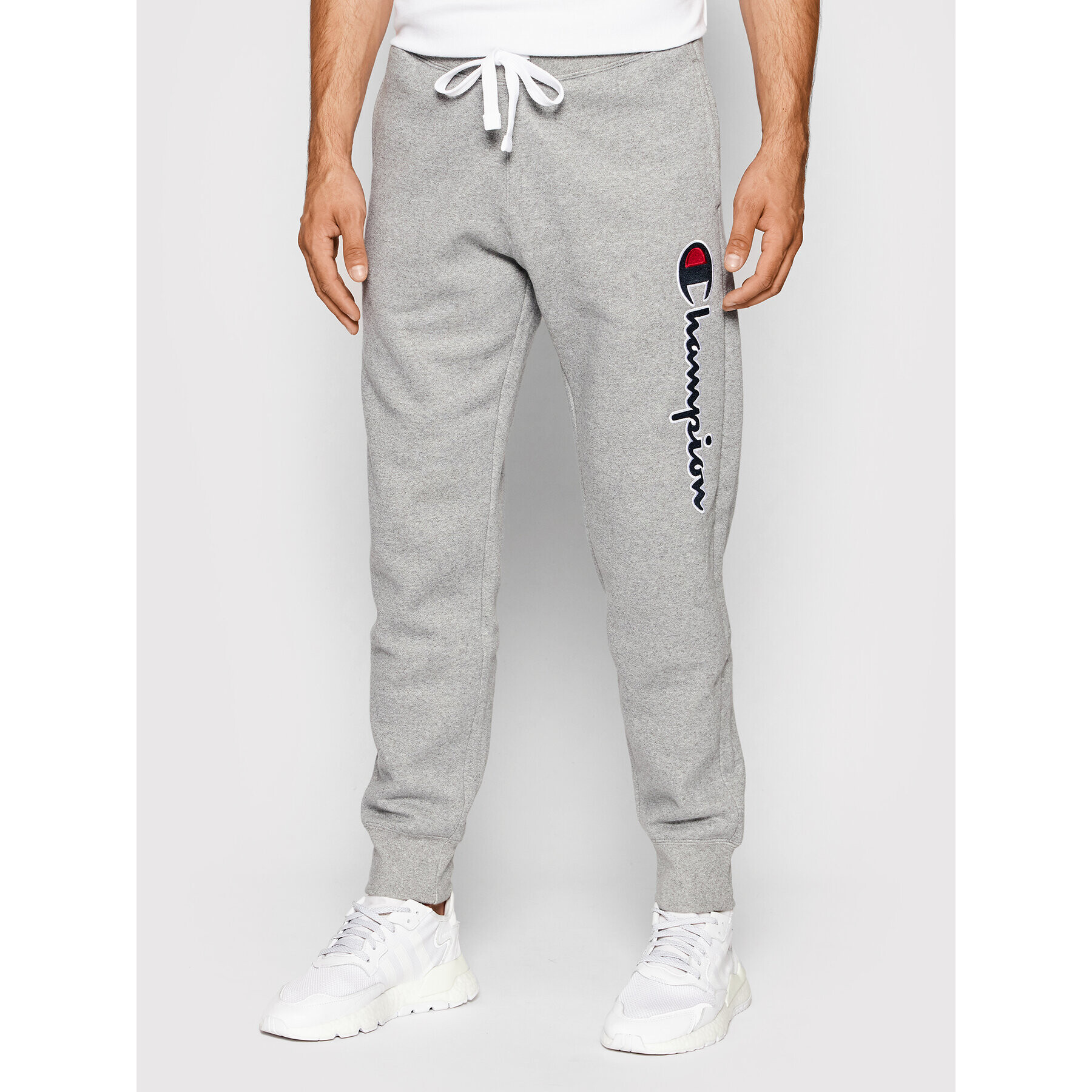 Champion Pantaloni trening Blend Vertical Script Logo 216472 Gri Regular Fit - Pled.ro