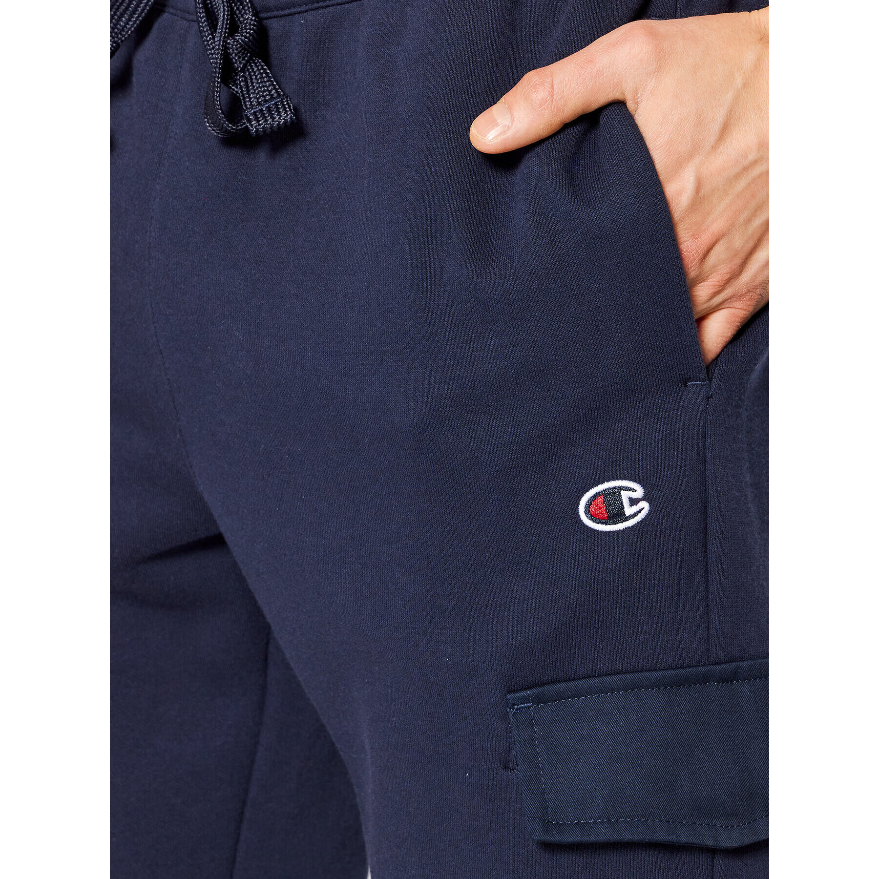 Champion Pantaloni trening Embroidered С Logo 217074 Bleumarin Regular Fit - Pled.ro