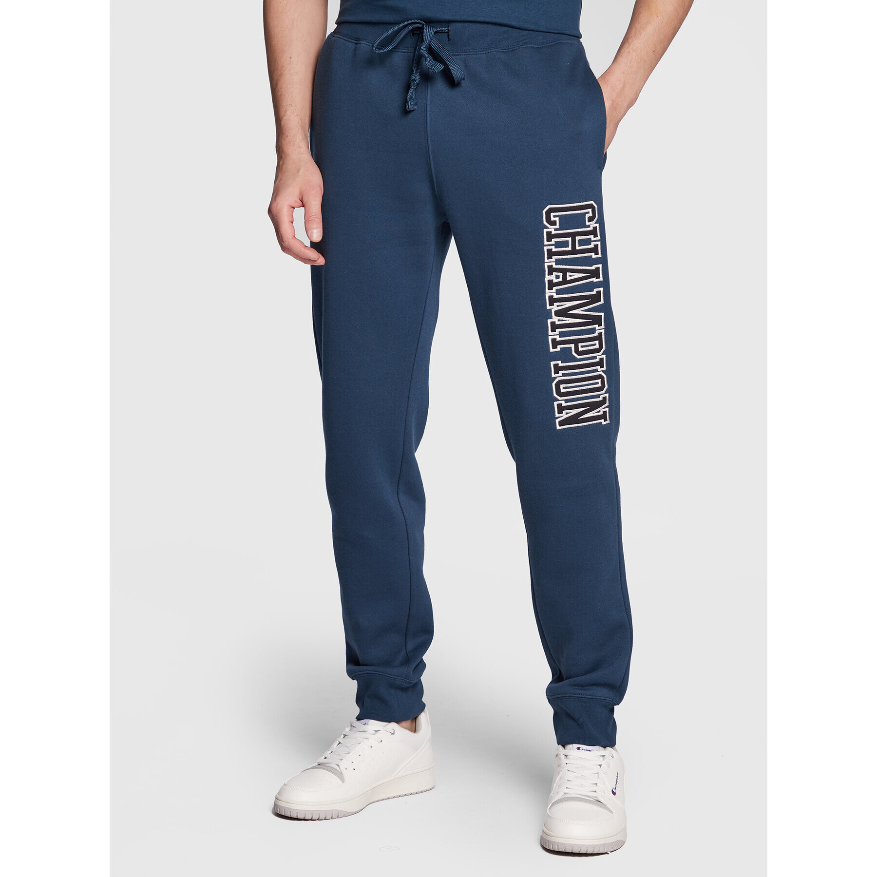 Champion Pantaloni trening Heavy Fleece Bookstore Logo 217880 Bleumarin Regular Fit - Pled.ro