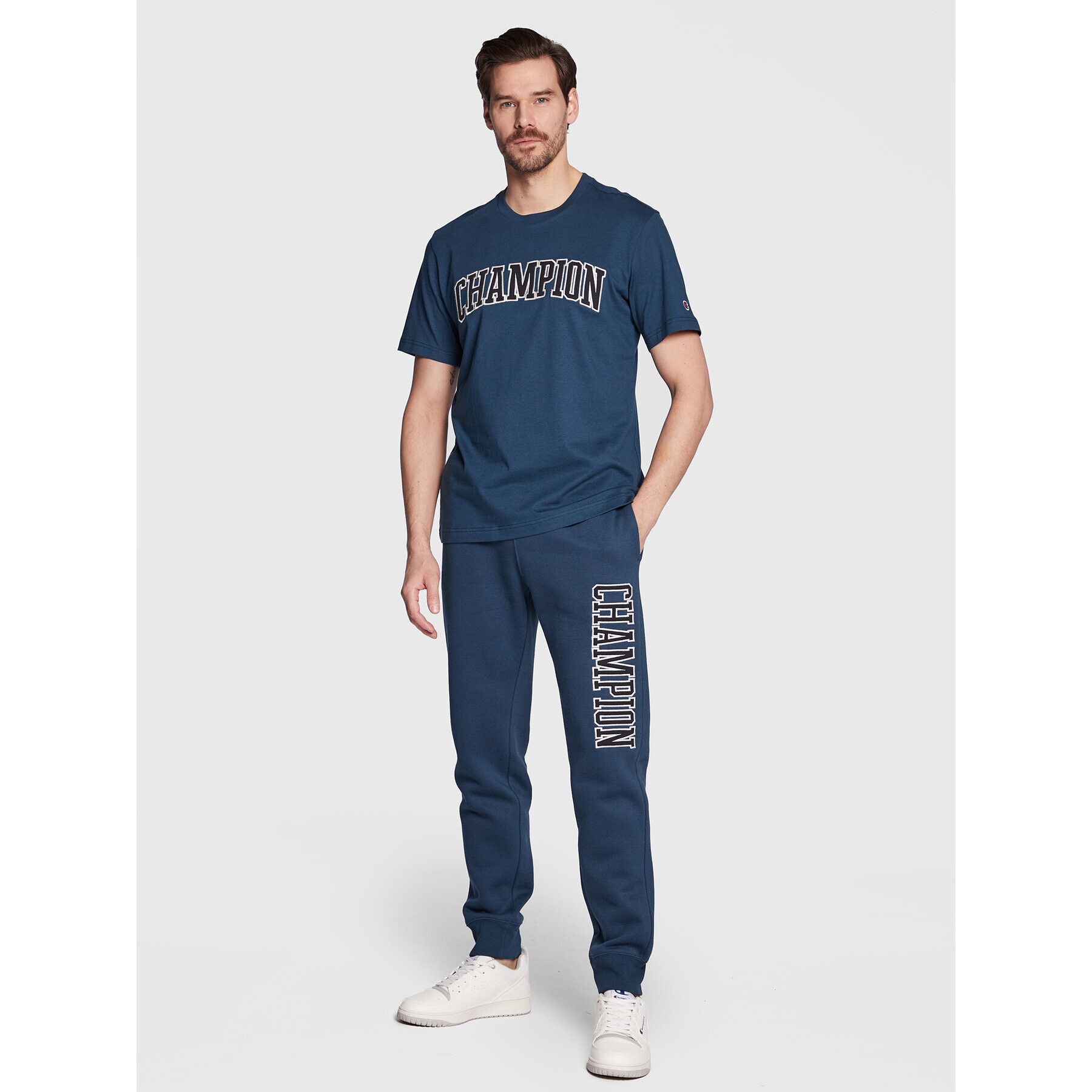 Champion Pantaloni trening Heavy Fleece Bookstore Logo 217880 Bleumarin Regular Fit - Pled.ro