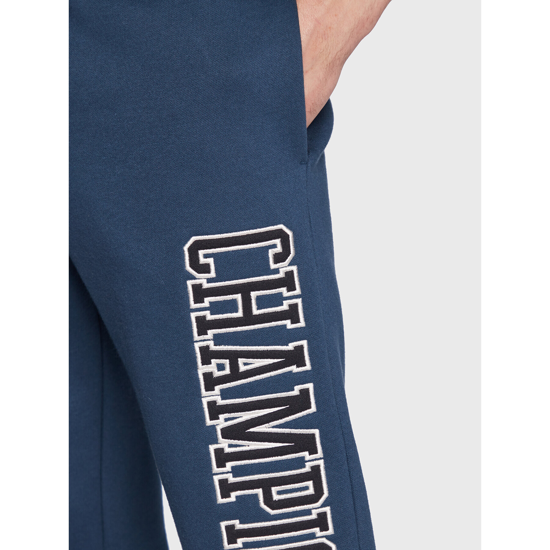 Champion Pantaloni trening Heavy Fleece Bookstore Logo 217880 Bleumarin Regular Fit - Pled.ro