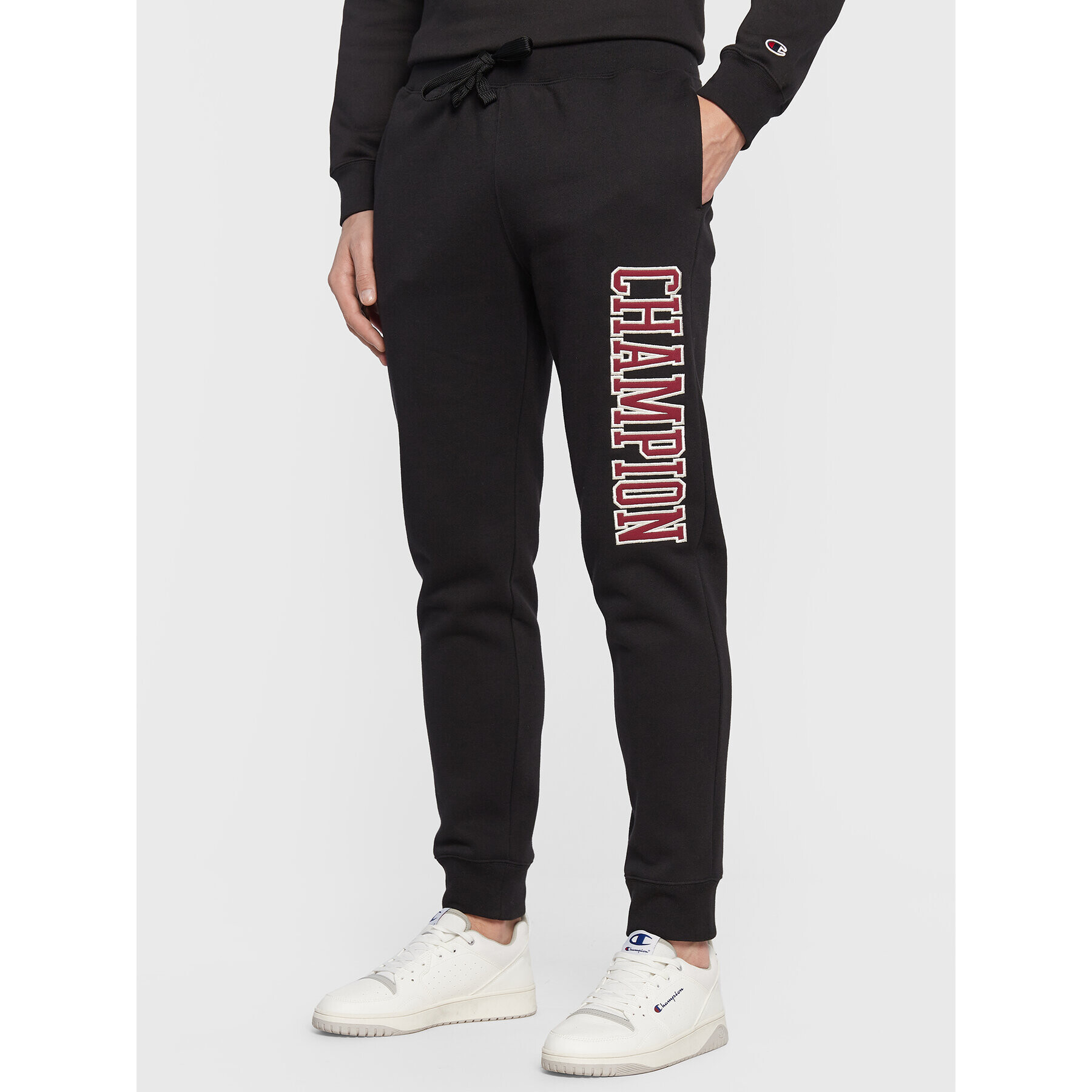 Champion Pantaloni trening Heavy Fleece Bookstore Logo 217880 Negru Regular Fit - Pled.ro