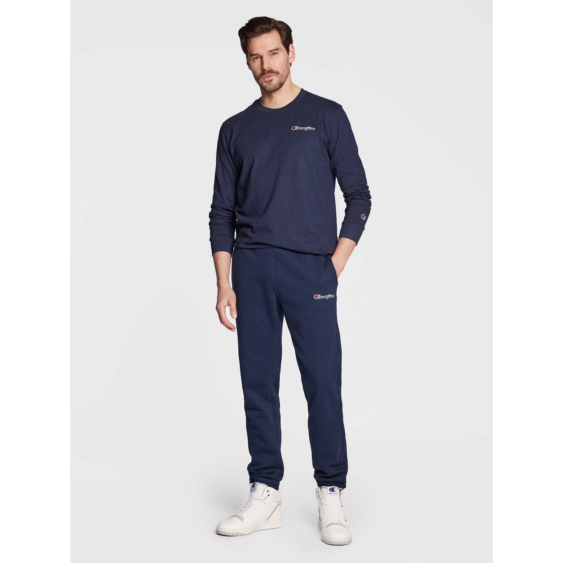 Champion Pantaloni trening Small Embroidery Script 218294 Bleumarin Regular Fit - Pled.ro