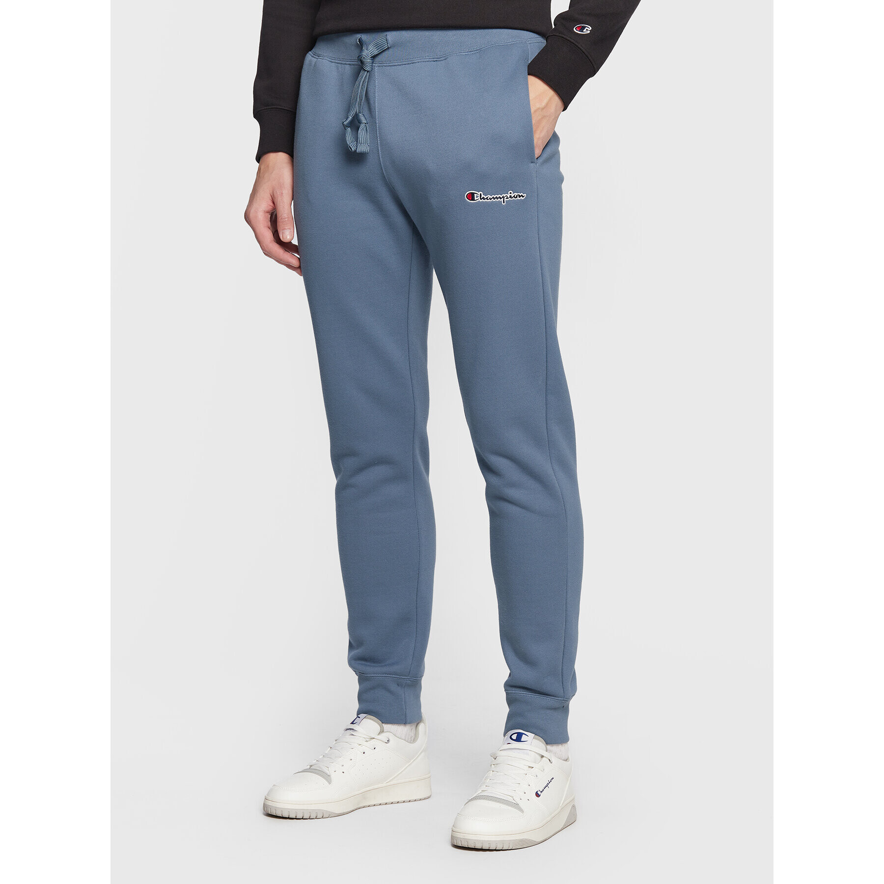 Champion Pantaloni trening Small Script Logo 217867 Albastru Regular Fit - Pled.ro