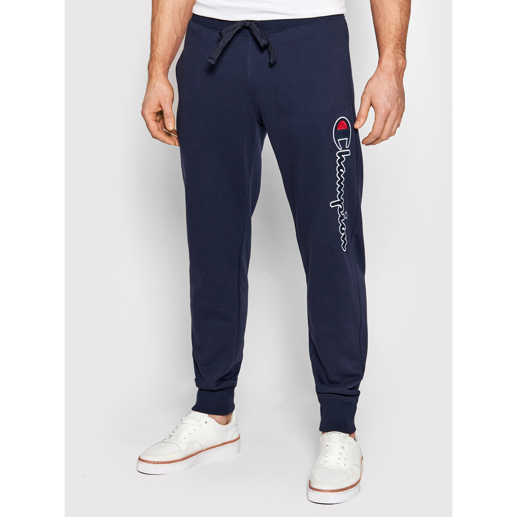 Champion Pantaloni trening Vertical Logo 217062 Bleumarin Regular Fit - Pled.ro