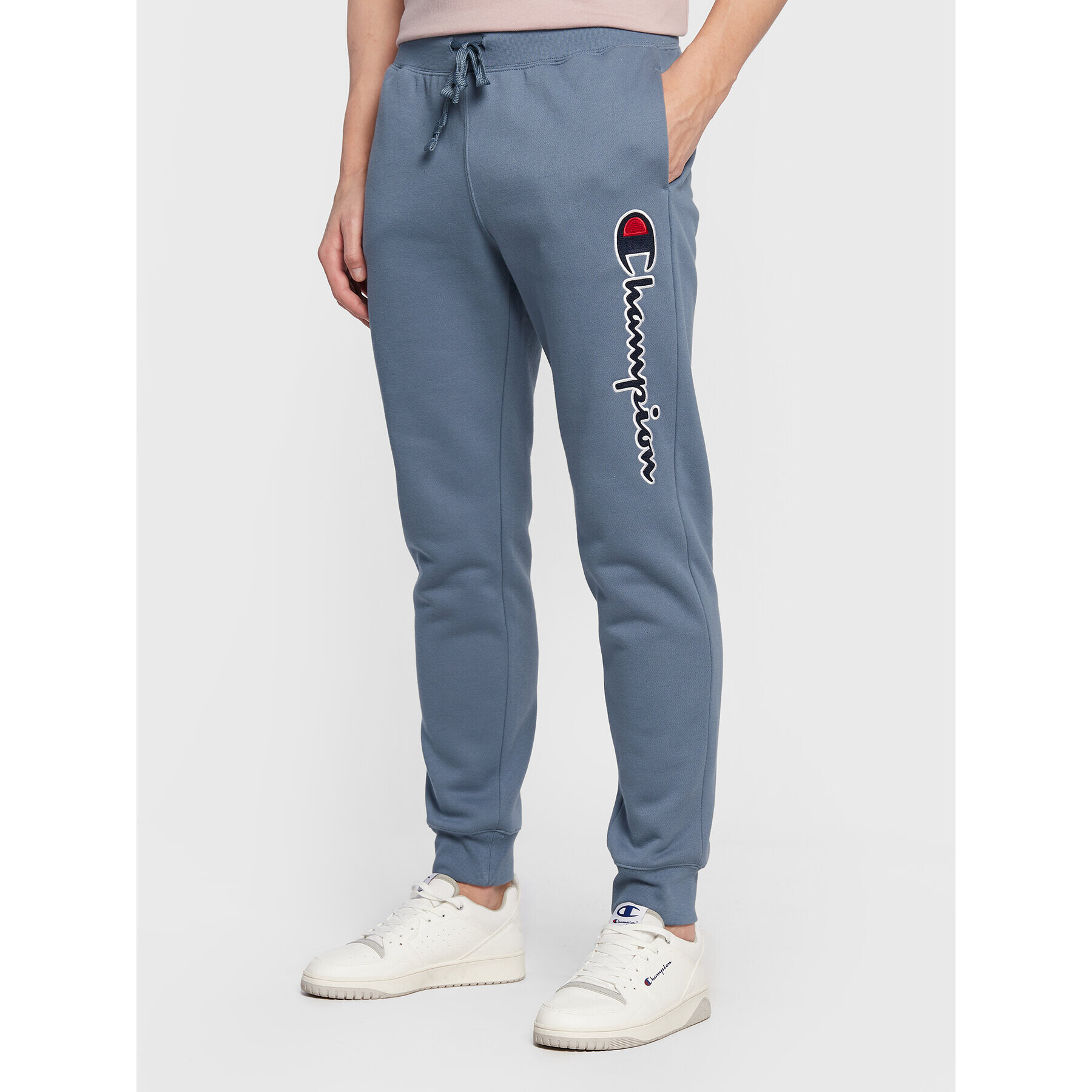 Champion Pantaloni trening Vertical Logo Embroidery 217860 Albastru Regular Fit - Pled.ro