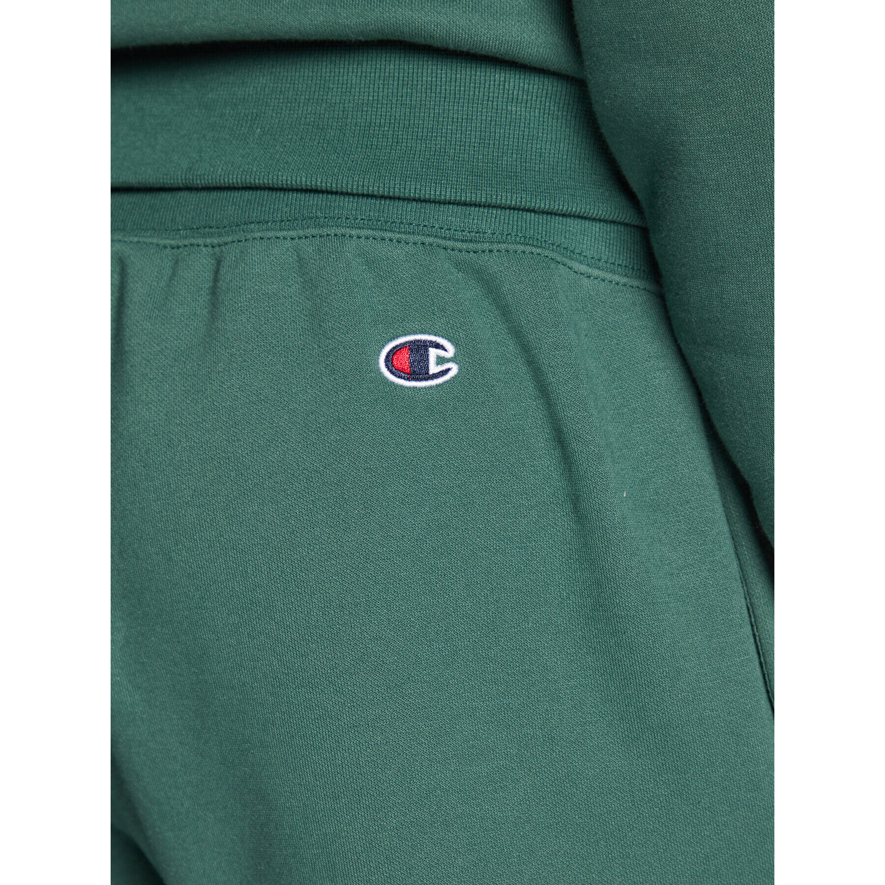 Champion Pantaloni trening Vertical Logo Embroidery 217860 Verde Regular Fit - Pled.ro