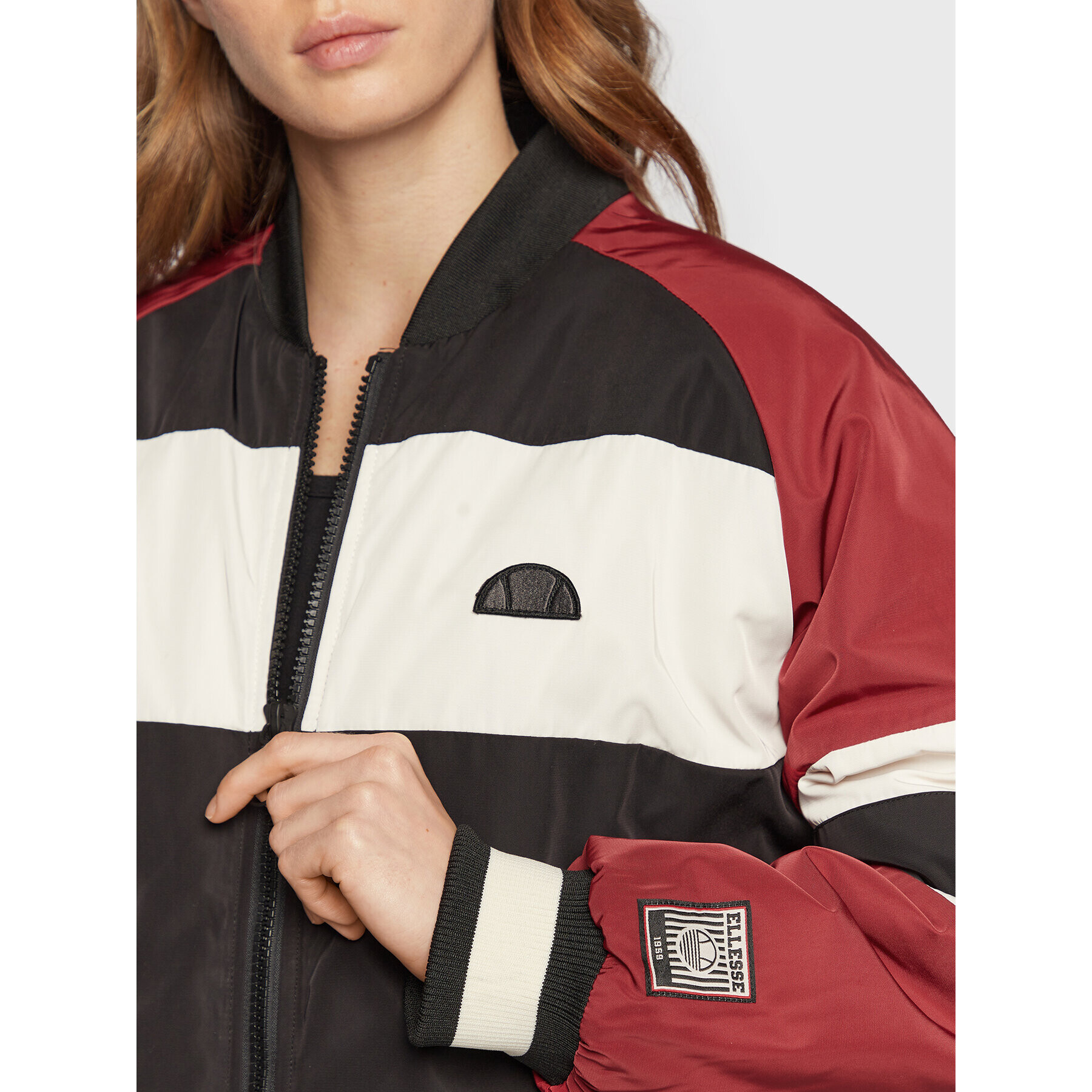 Ellesse Geacă bomber Doretheo SGP16133 Negru Regular Fit - Pled.ro