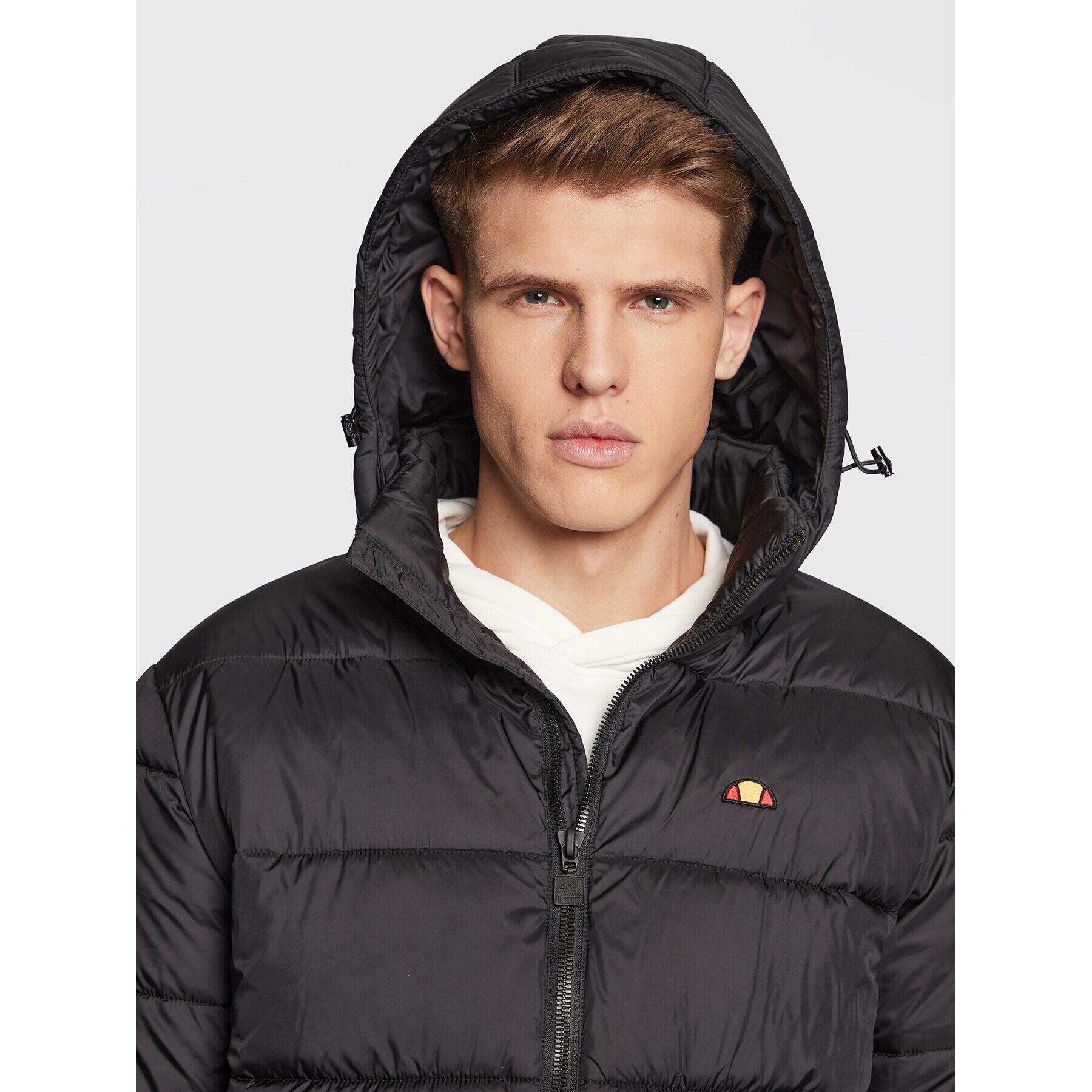 Ellesse Geacă din puf SHQ17079 Negru Regular Fit - Pled.ro