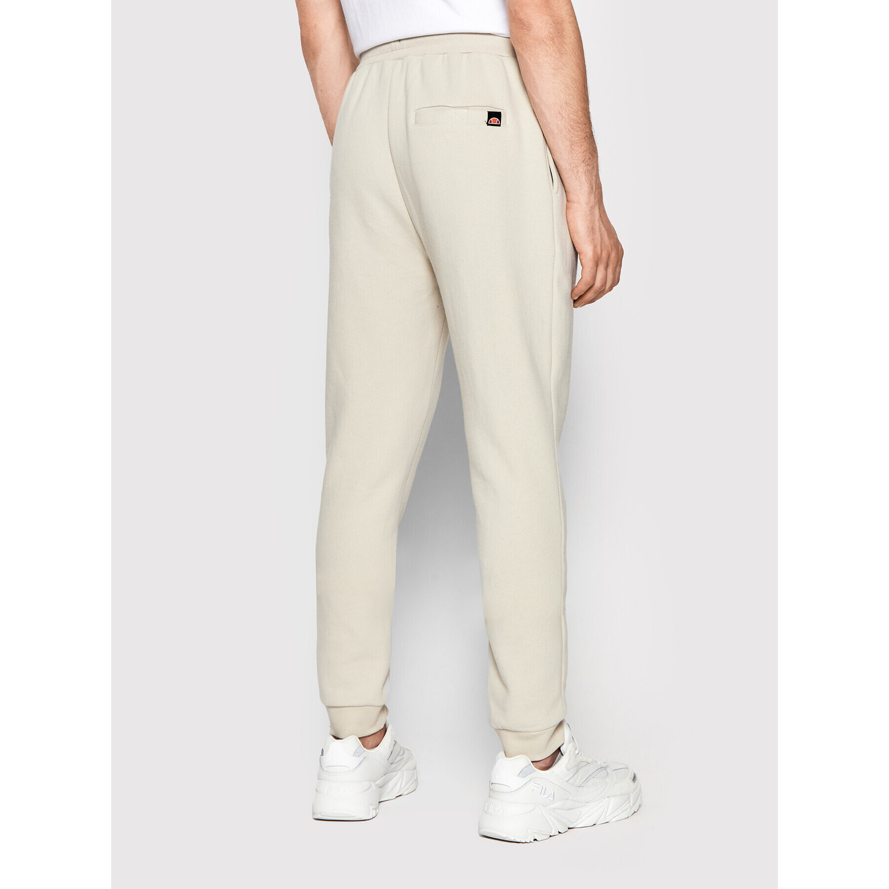 Ellesse Pantaloni trening Granite SHM12643 Bej Regular Fit - Pled.ro