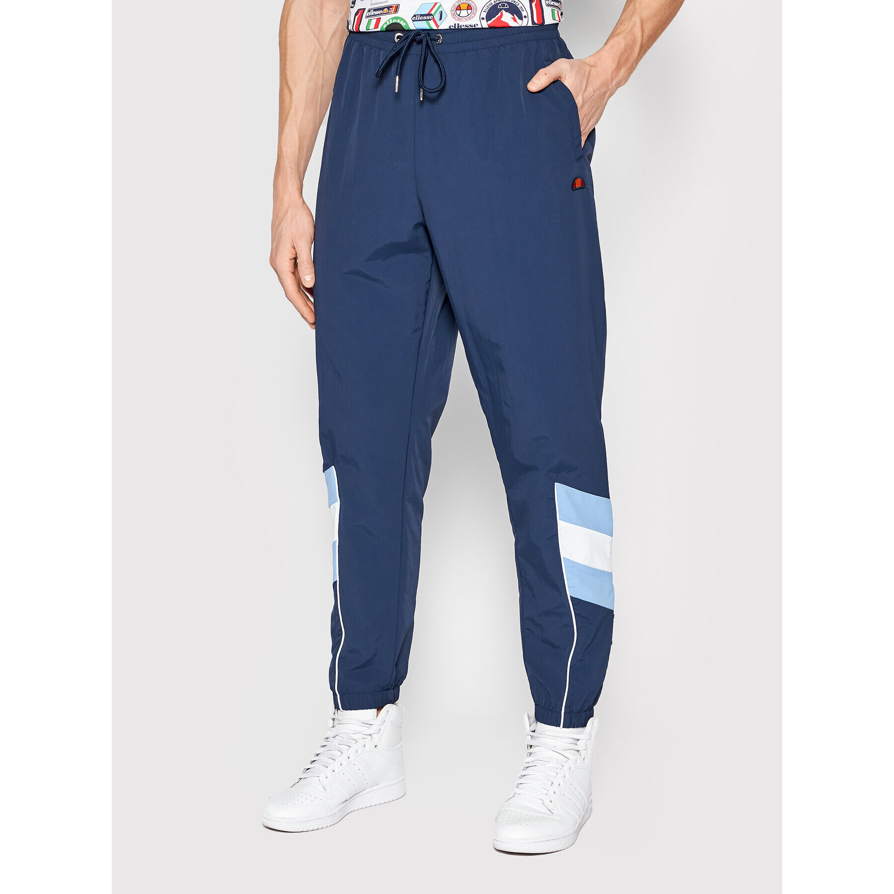 Ellesse Pantaloni trening Minuti SHM14227 Bleumarin Regular Fit - Pled.ro