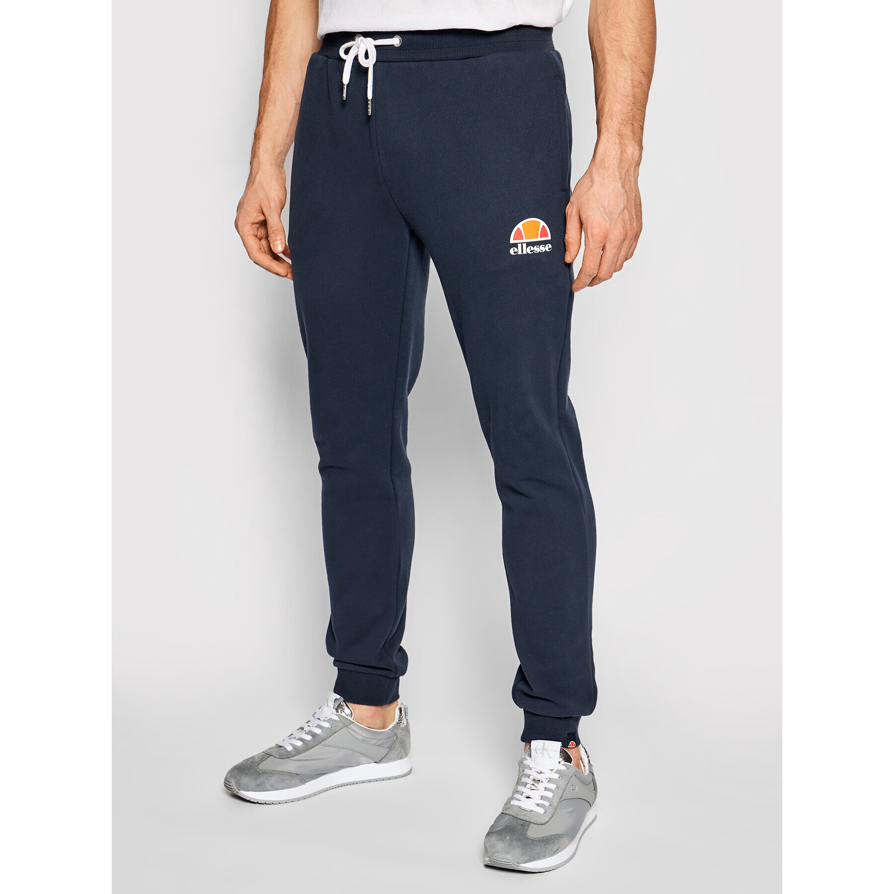 Ellesse Pantaloni trening Ovest SHS01763 Bleumarin Regular Fit - Pled.ro