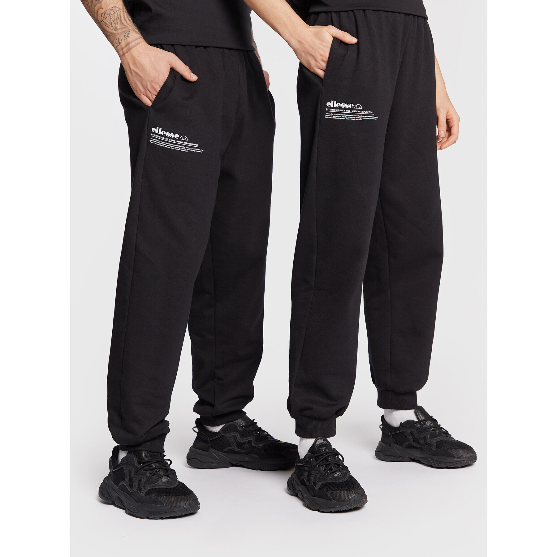 Ellesse Pantaloni trening Unisex Dimartino SGP16249 Negru Regular Fit - Pled.ro