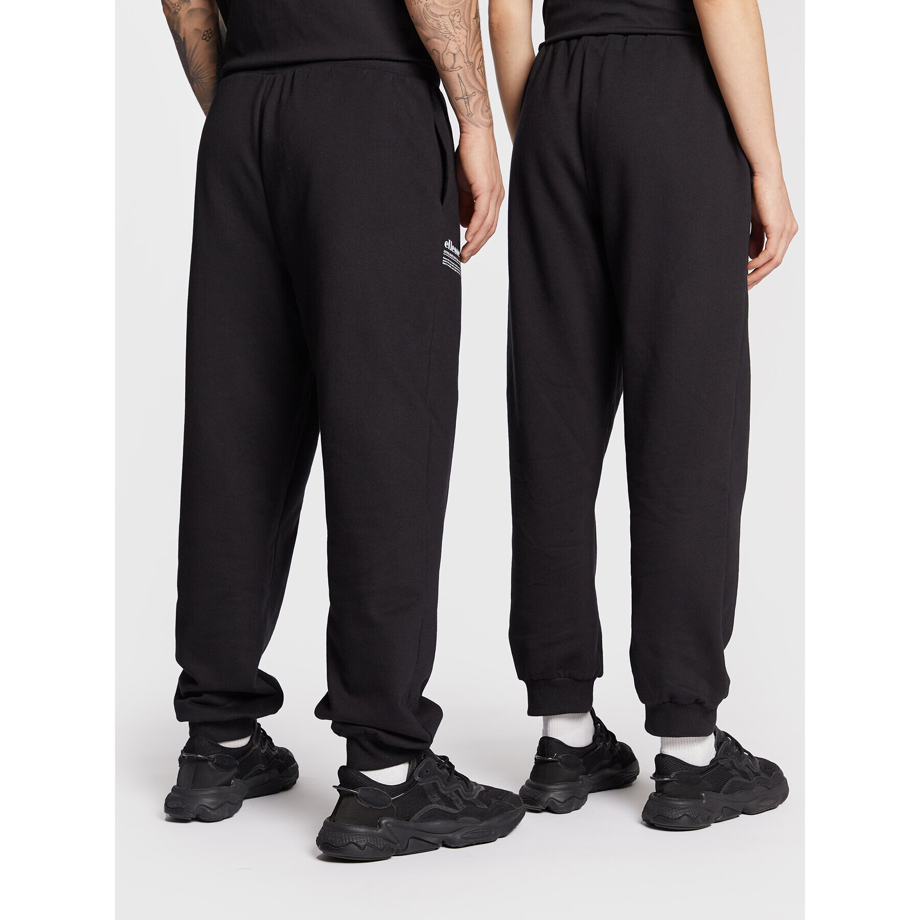 Ellesse Pantaloni trening Unisex Dimartino SGP16249 Negru Regular Fit - Pled.ro