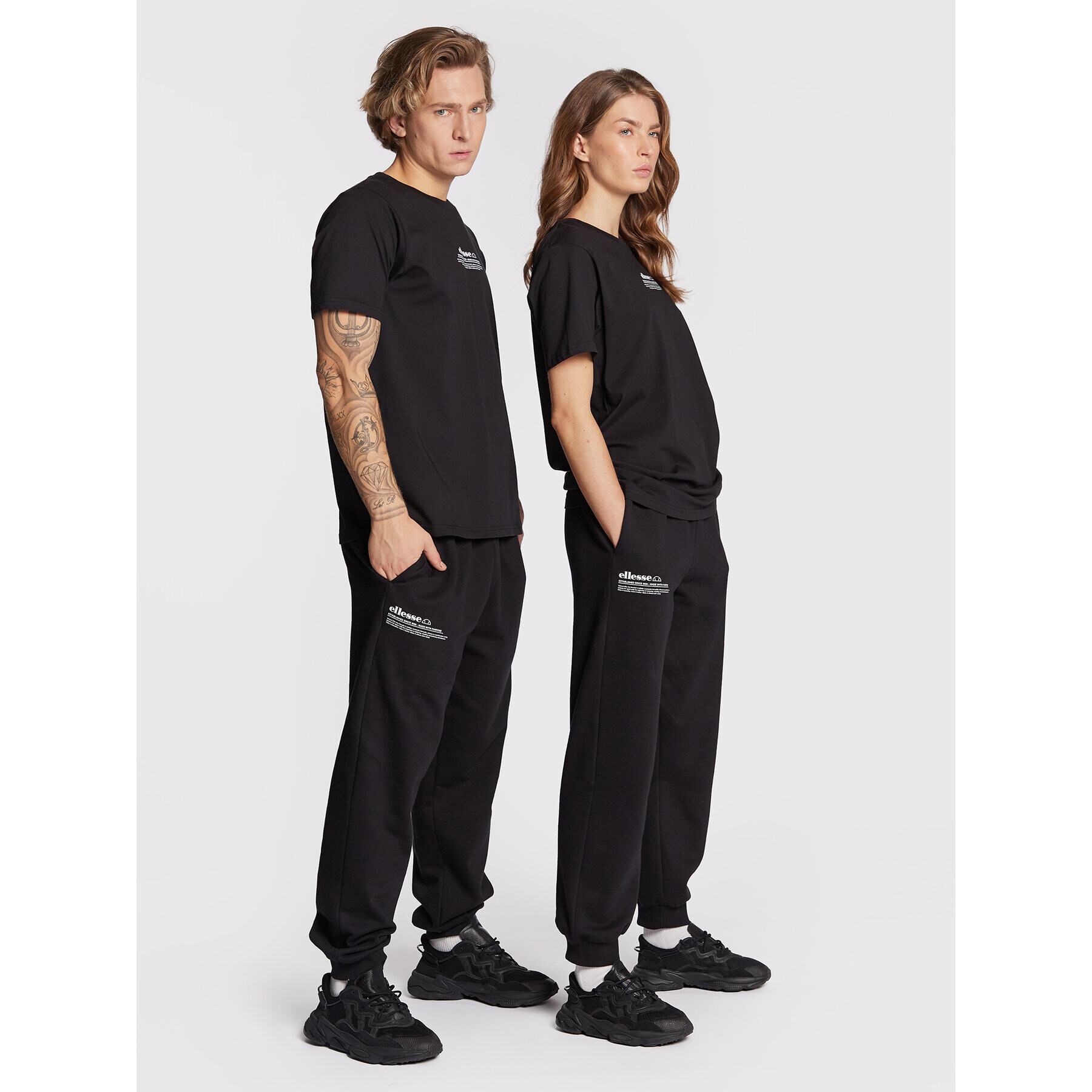 Ellesse Pantaloni trening Unisex Dimartino SGP16249 Negru Regular Fit - Pled.ro