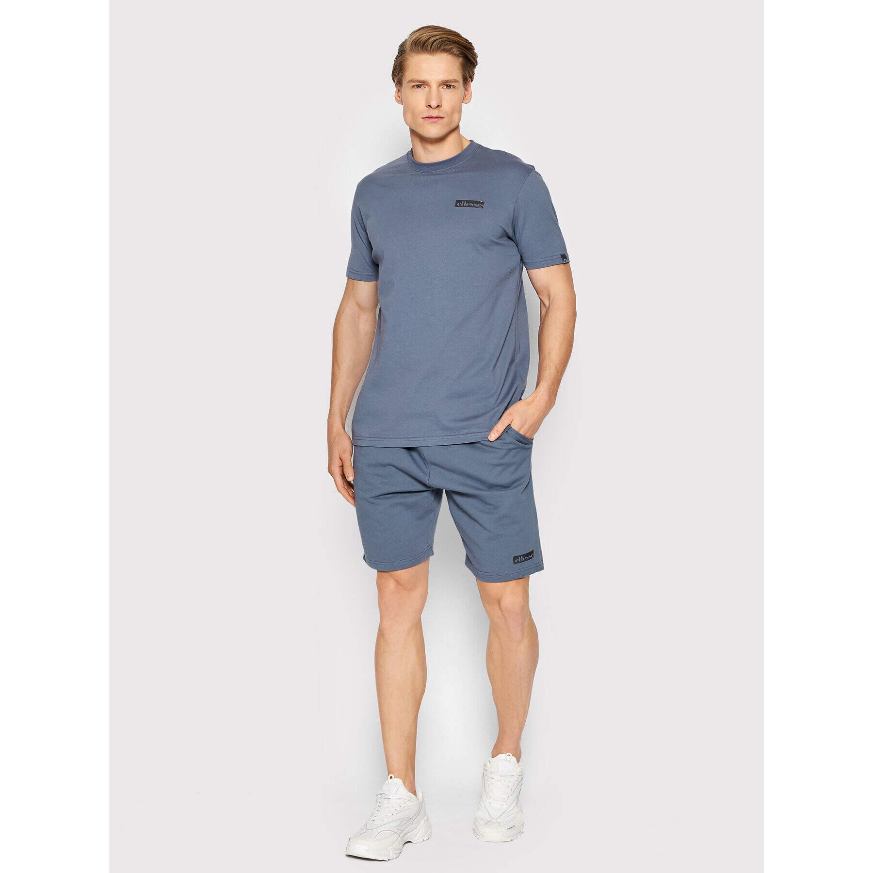 Ellesse Set tricou și pantaloni scurți sport Oulan SHM14366 Albastru Regular Fit - Pled.ro