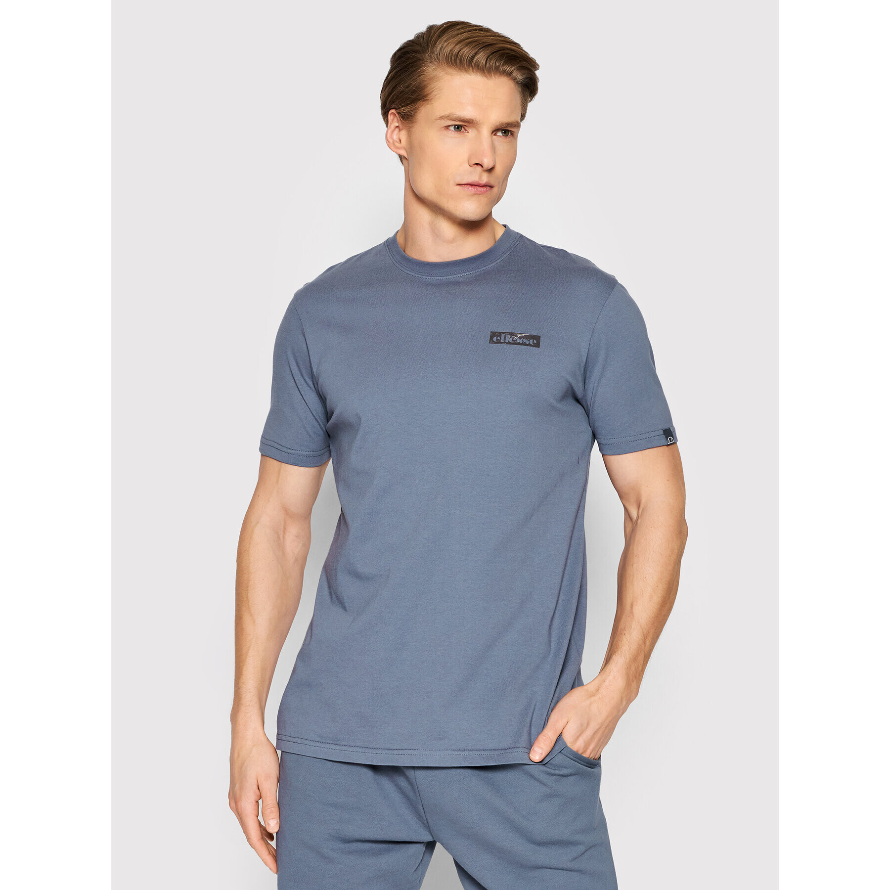 Ellesse Set tricou și pantaloni scurți sport Oulan SHM14366 Albastru Regular Fit - Pled.ro