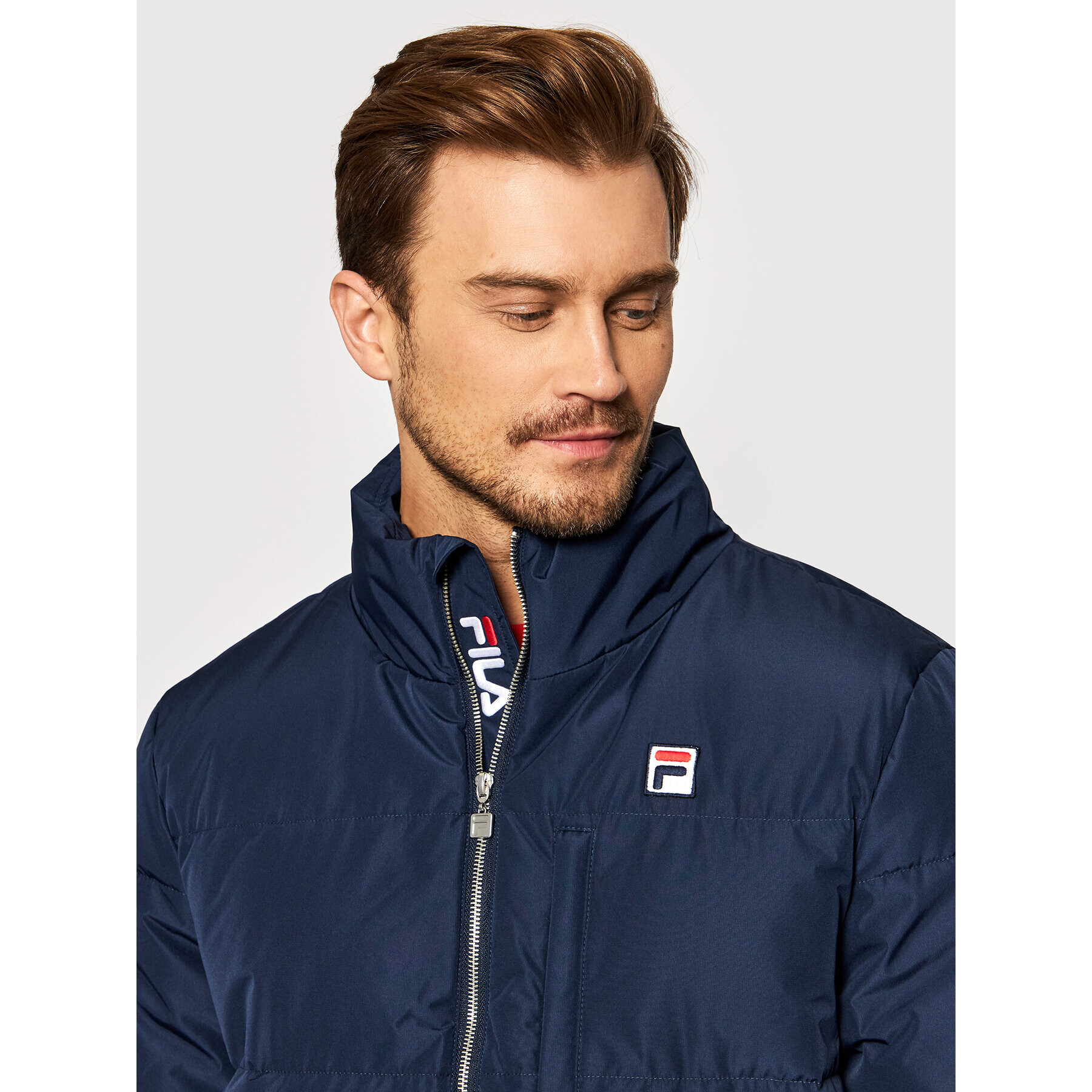 Fila Geacă din puf Avventura 687859 Bleumarin Regular Fit - Pled.ro