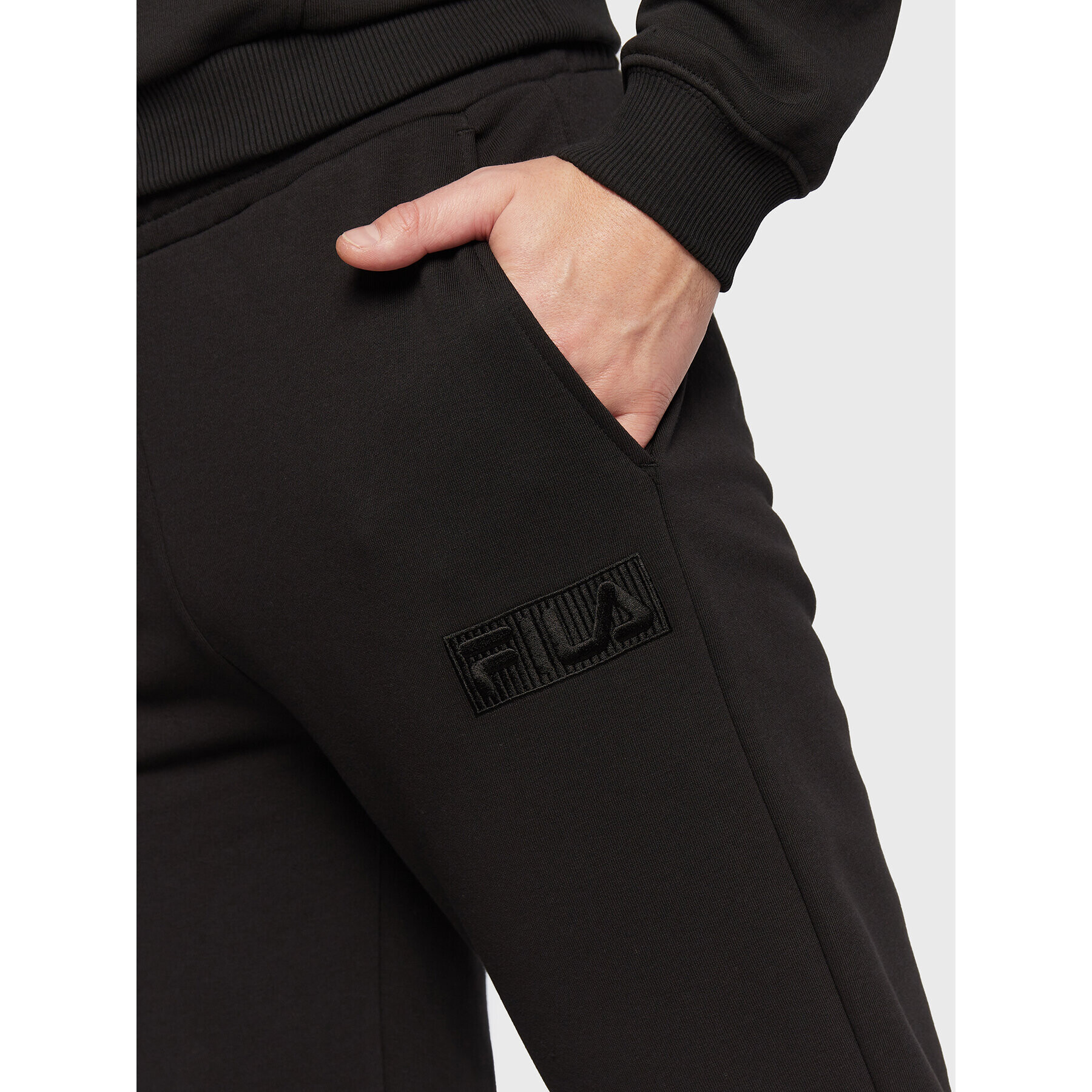 Fila Pantaloni trening Baska FAM0160 Negru Regular Fit - Pled.ro