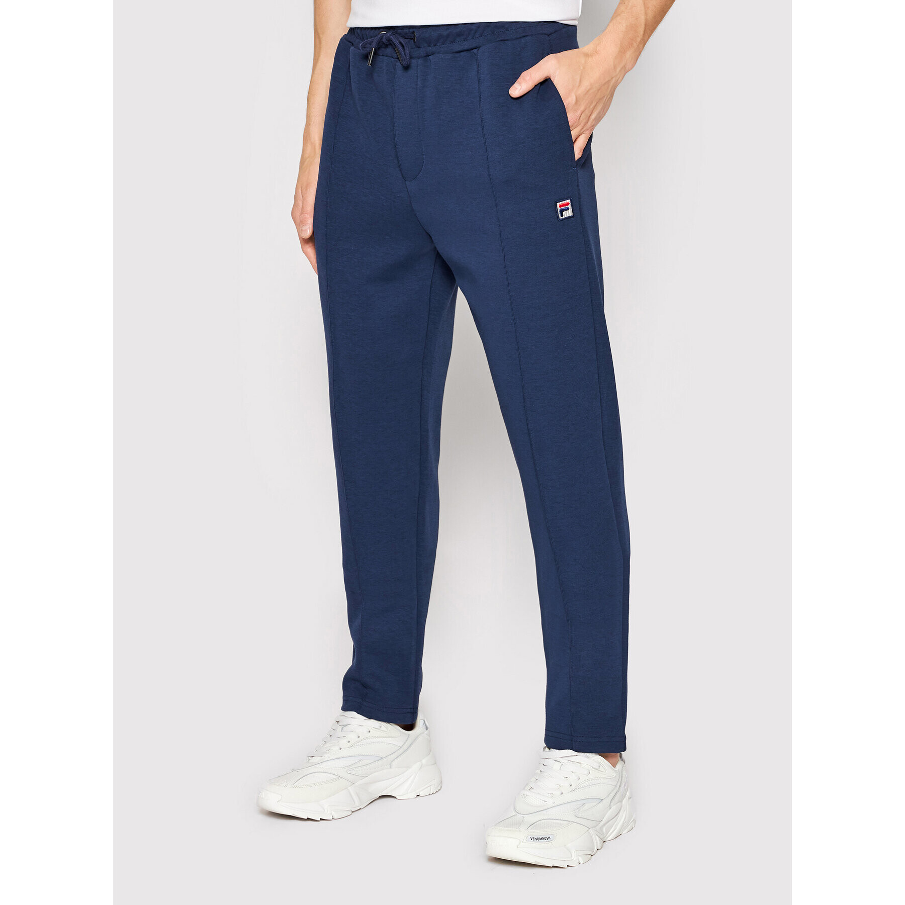 Fila Pantaloni trening Buffalo FAM0071 Bleumarin Regular Fit - Pled.ro