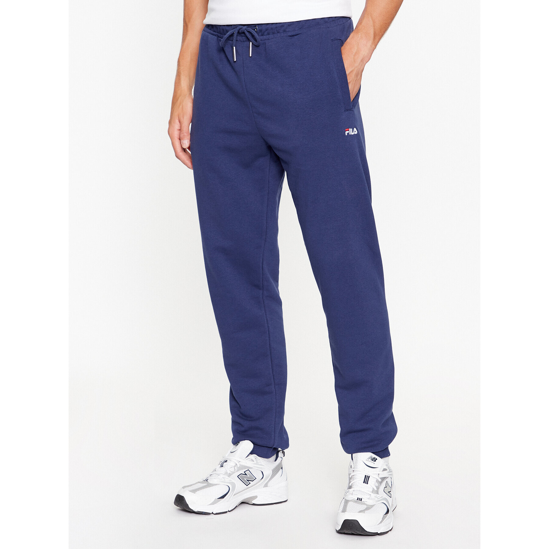 Fila Pantaloni trening FAM0342 Albastru Regular Fit - Pled.ro