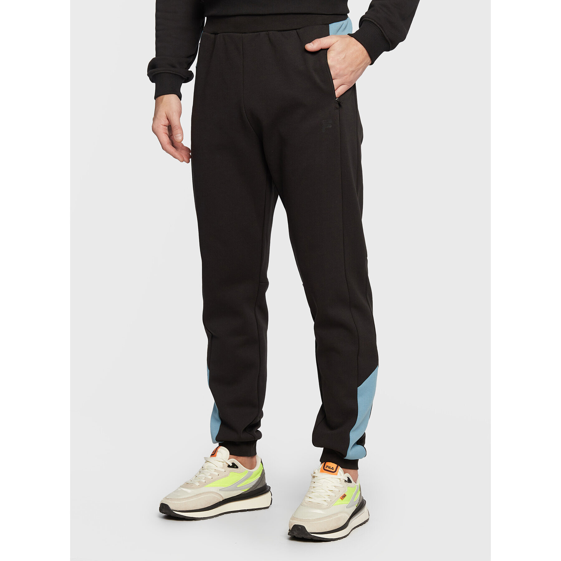 Fila Pantaloni trening Rabaul FAM0129 Negru Slim Fit - Pled.ro