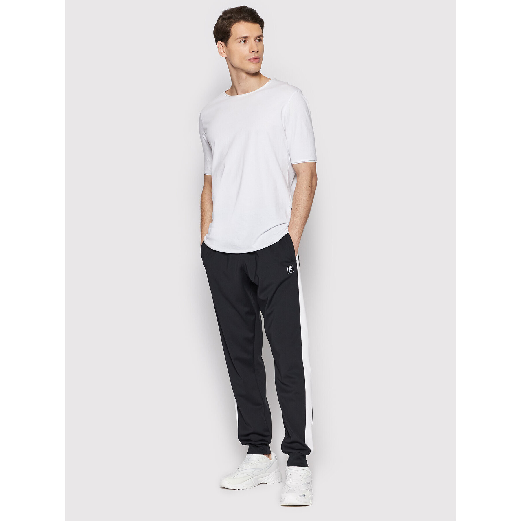 Fila Pantaloni trening Remond 689346 Negru Regular Fit - Pled.ro