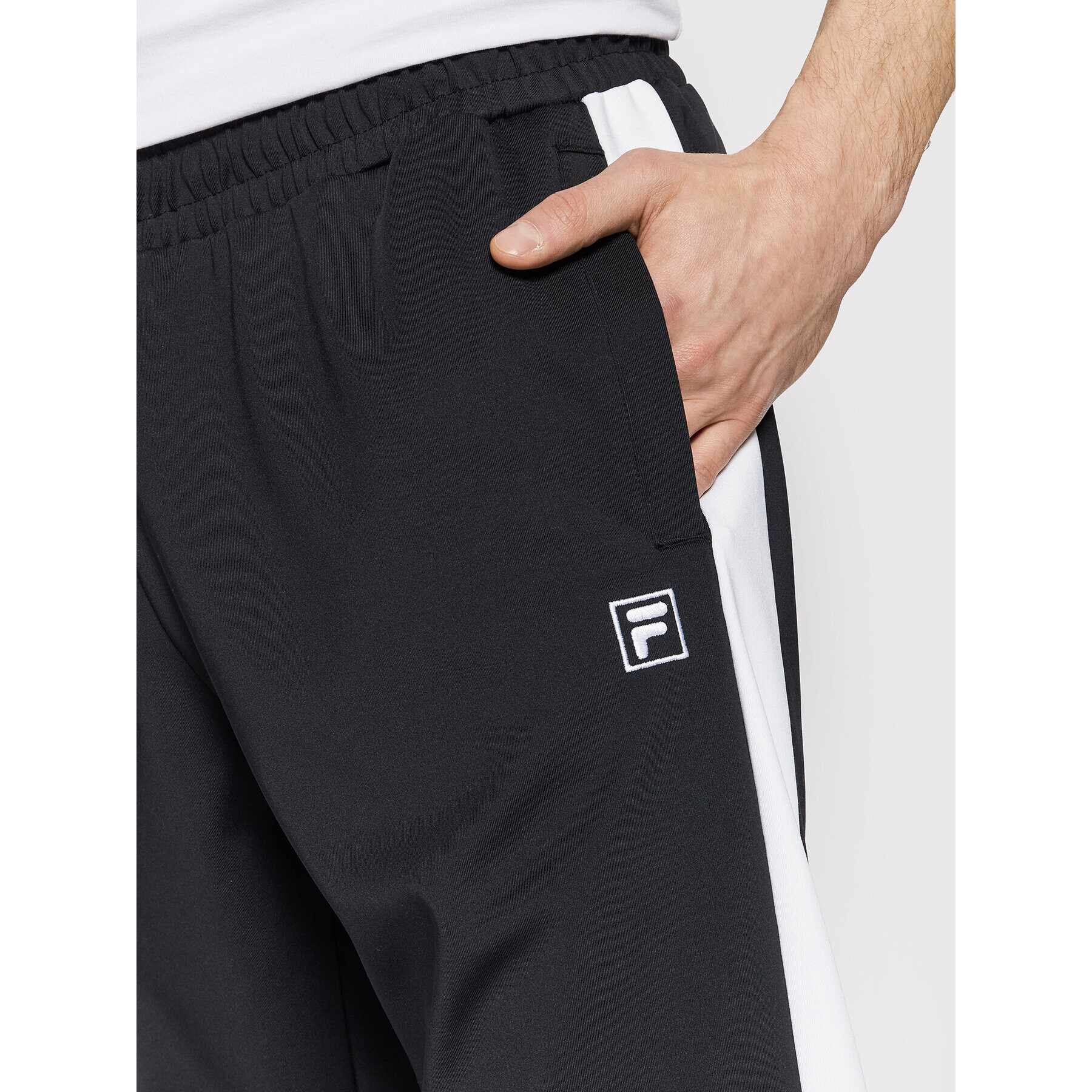 Fila Pantaloni trening Remond 689346 Negru Regular Fit - Pled.ro