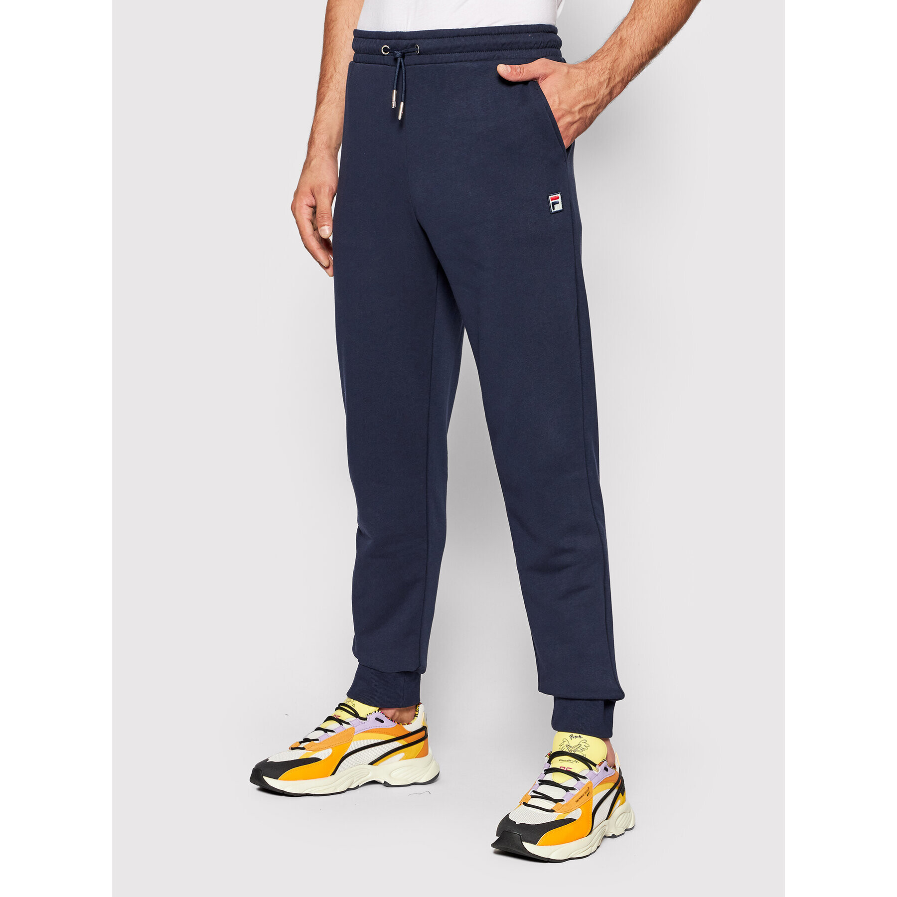 Fila Pantaloni trening Savir 689037 Bleumarin Regular Fit - Pled.ro