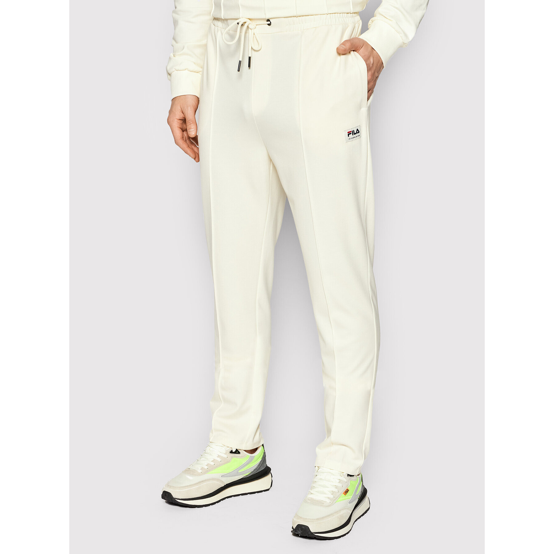 Fila Pantaloni trening Tatvan FAM0037 Bej Regular Fit - Pled.ro