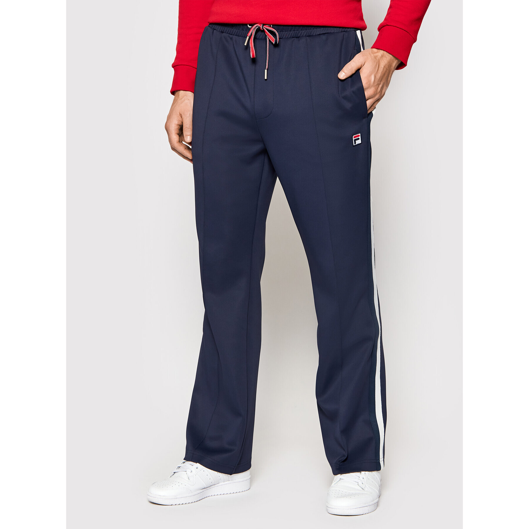 Fila Pantaloni trening Tauri 689170 Bleumarin Regular Fit - Pled.ro