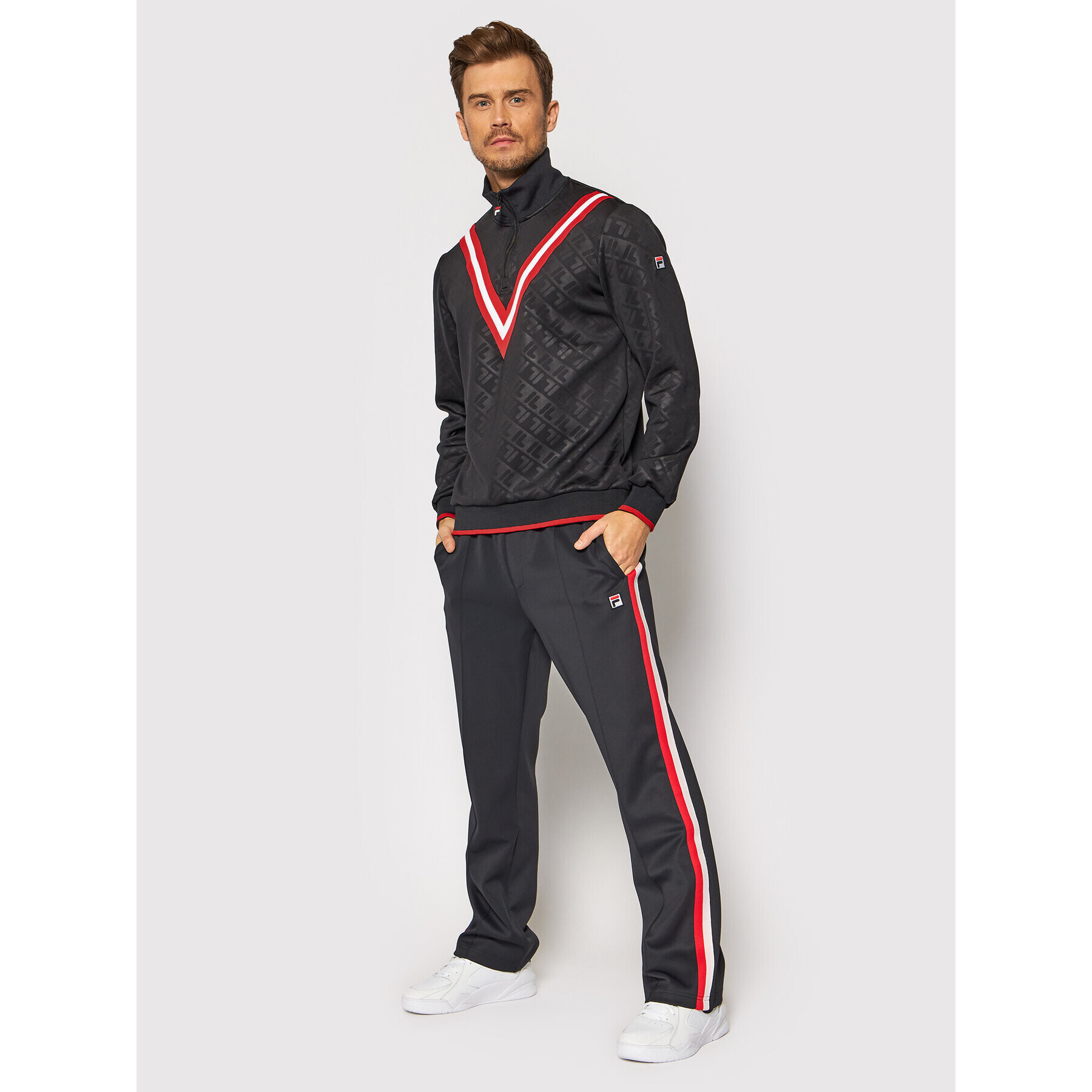 Fila Pantaloni trening Tauri 689170 Negru Regular Fit - Pled.ro