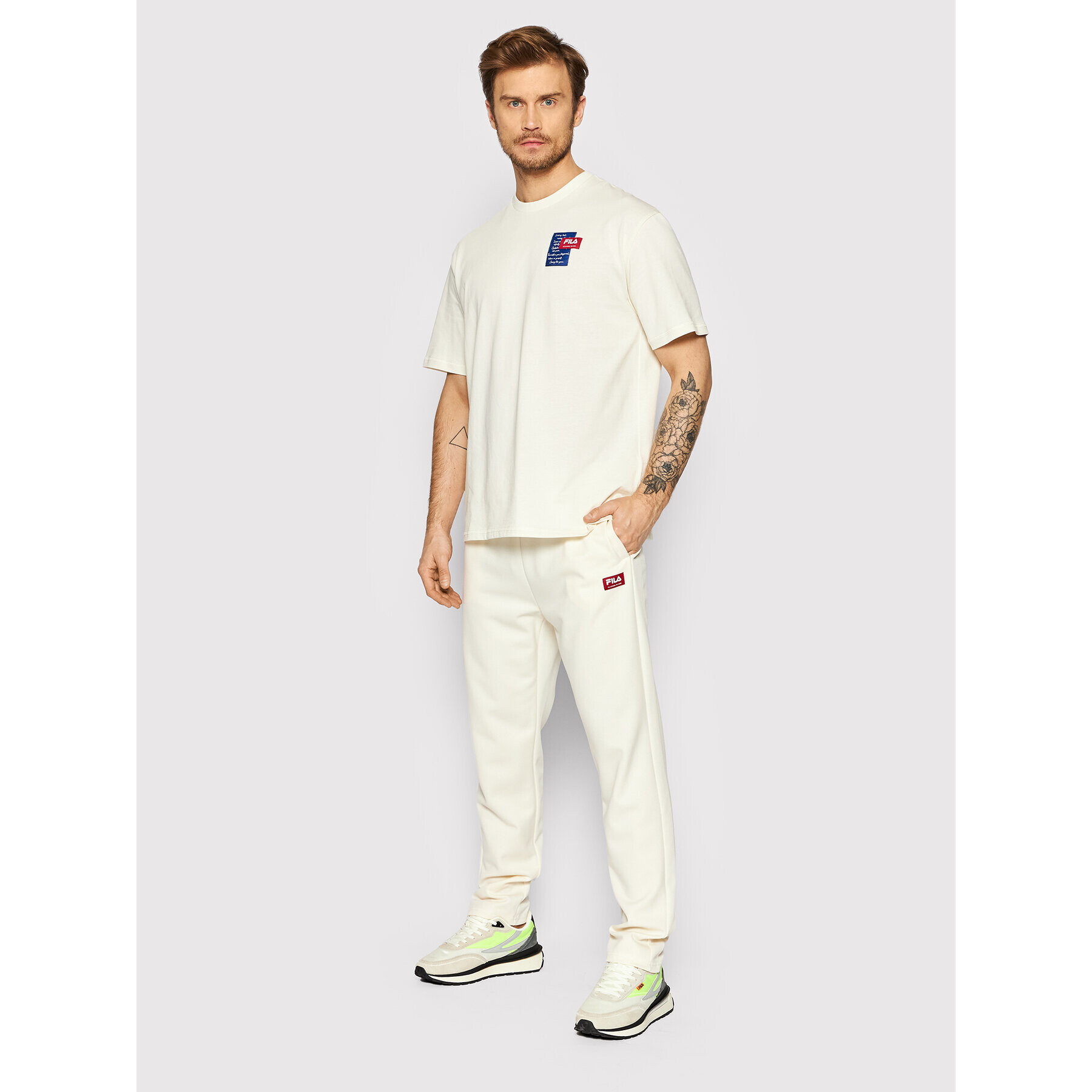 Fila Pantaloni trening Treviso FAM0019 Bej Tapered Fit - Pled.ro