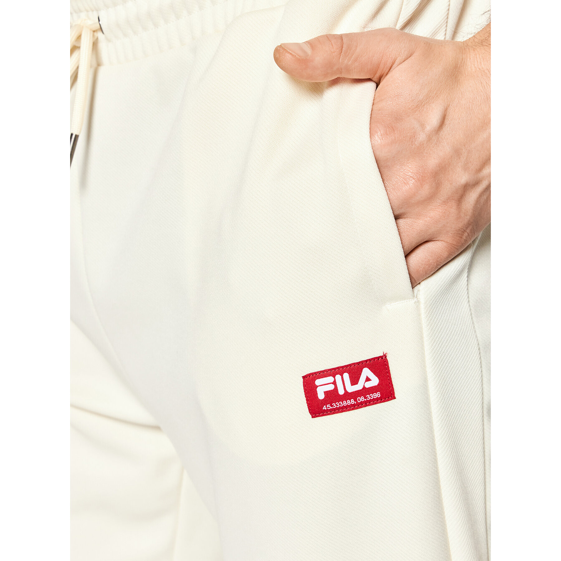 Fila Pantaloni trening Treviso FAM0019 Bej Tapered Fit - Pled.ro